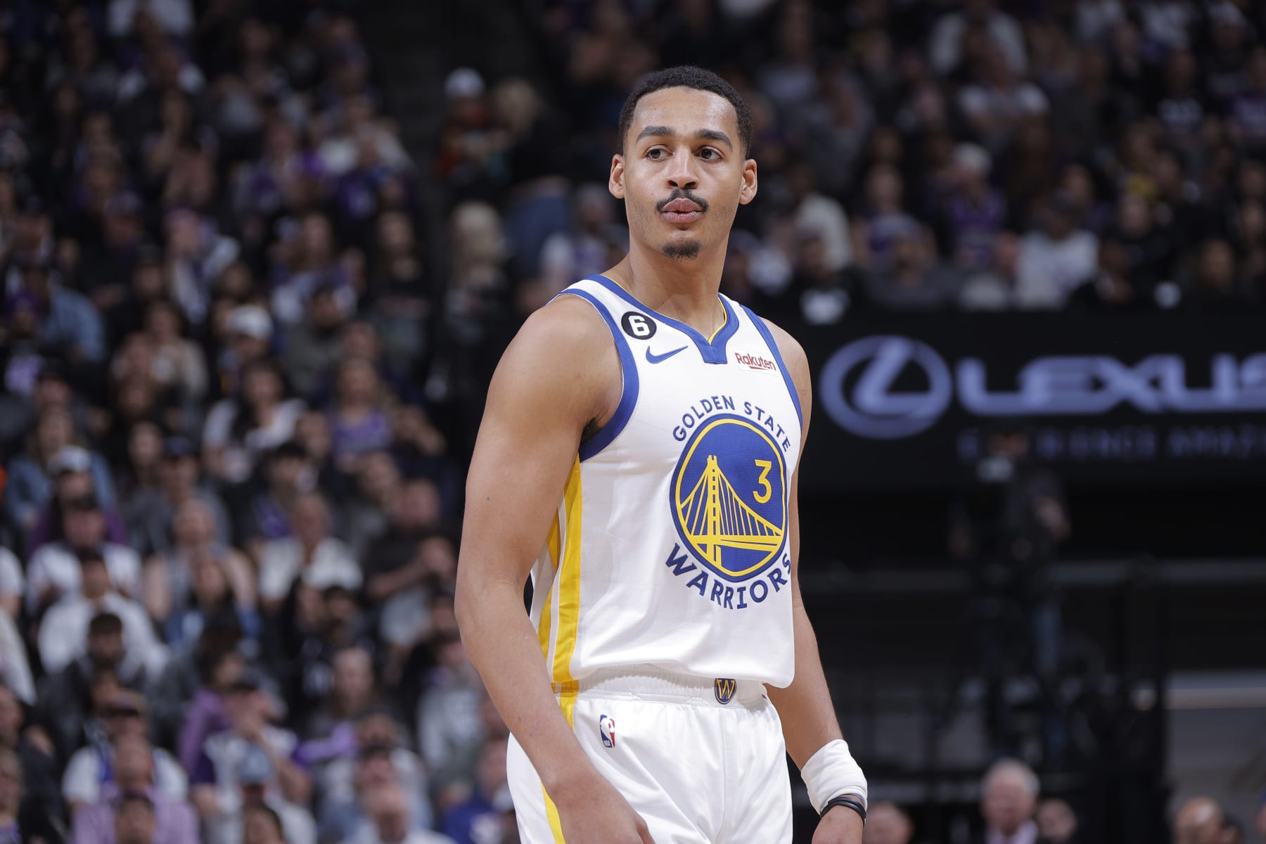 SACRAMENTO, CA - APRIL 17: Jordan Poole #3 of the Golden State Warriors looks on during the game against the Sacramento Kings during Round 1 Game 2 of the 2023 NBA Playoffs on April 17, 2023 at Golden 1 Center in Sacramento, California. NOTE TO USER: User expressly acknowledges and agrees that, by downloading and or using this photograph, User is consenting to the terms and conditions of the Getty Images Agreement. Mandatory Copyright Notice: Copyright 2023 NBAE (Photo by Rocky Widner/NBAE via Getty Images)