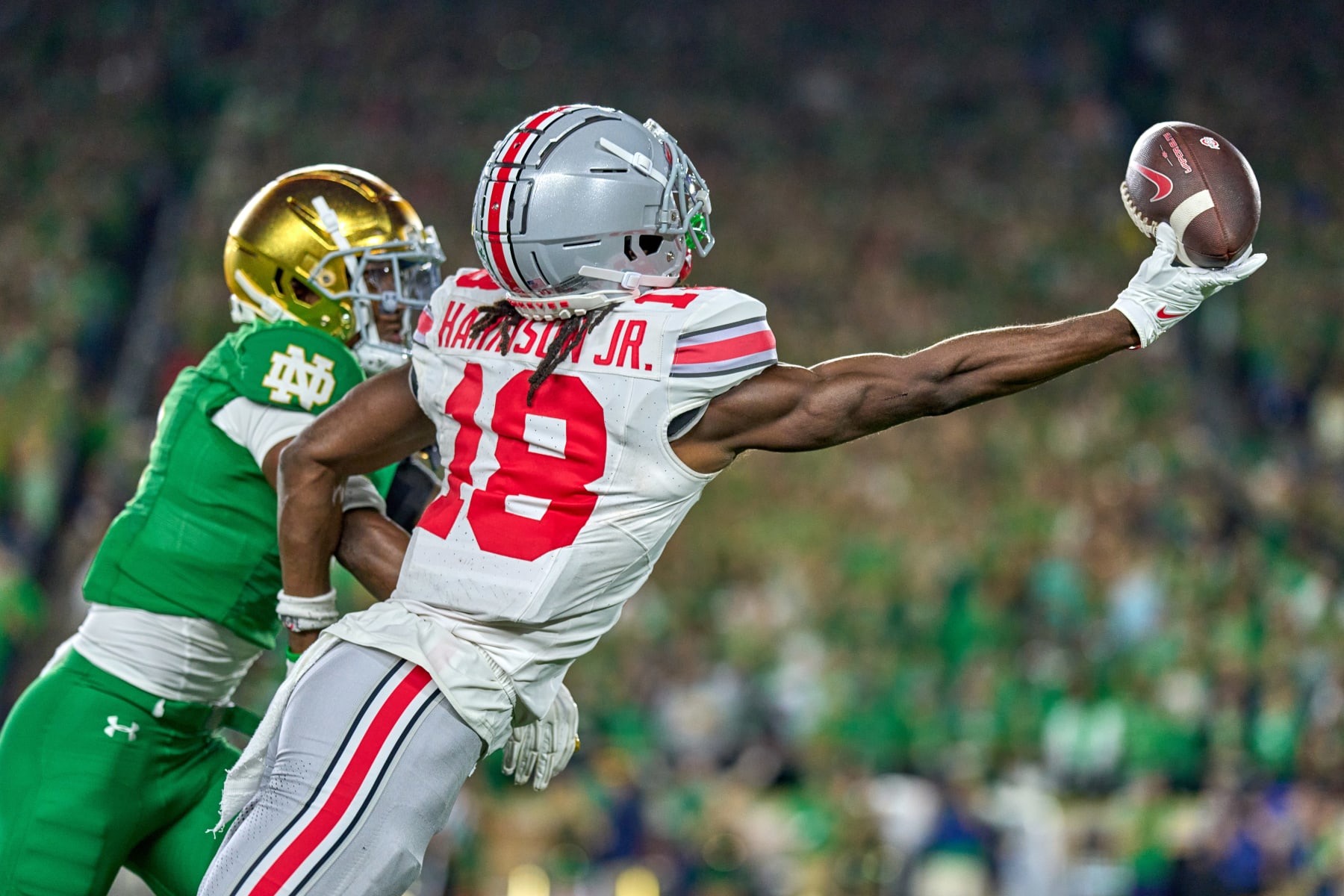 SOUTH BEND, IN - SEPTEMBER 23: Ohio State Buckeyes wide receiver Marvin Harrison Jr. (18) attempts to catch the football in action during a football game between the Notre Dame Fighting Irish and the Ohio State Buckeyes on September 23, 2023 at Notre Dame Stadium in South Bend, IN. (Photo by Robin Alam/Icon Sportswire via Getty Images)