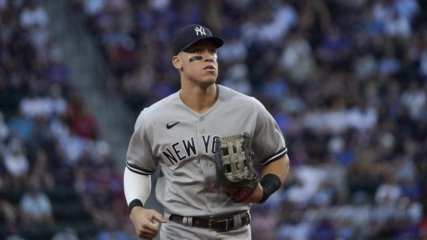 New York Yankees' Aaron Judge runs to the dugout during a baseball game against the Texas Rangers in Arlington, Texas, Monday, Oct. 3, 2022. (AP Photo/LM Otero)