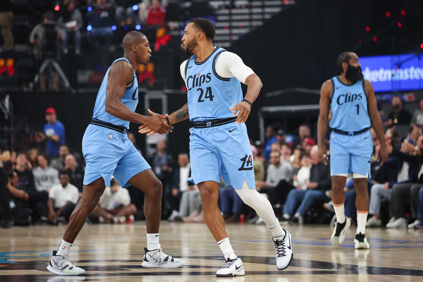 INGLEWOOD, CALIFORNIA - NOVEMBER 17: Kris Dunn #8 and Norman Powell #24 of the LA Clippers react in the first half against the Utah Jazz at Intuit Dome on November 17, 2024 in Inglewood, California. NOTE TO USER: User expressly acknowledges and agrees that, by downloading and/or using this photograph, user is consenting to the terms and conditions of the Getty Images License Agreement. (Photo by Meg Oliphant/Getty Images)