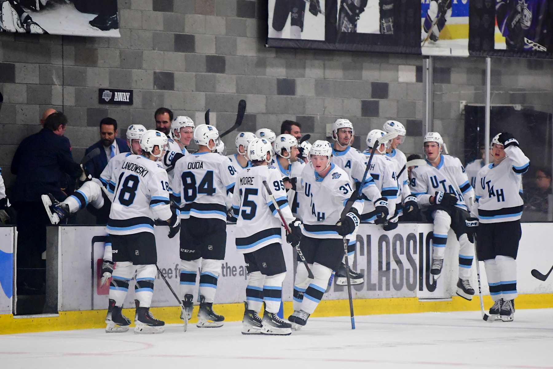 LOS ANGELES, CA - SEPTEMBER 14: Owen Allard #37 of the Utah Hockey Club celebrates his game-winning goal with teammates during overtime against the Los Angeles Kings at the Toyota Sports Performance Center on September 14, 2024 in Los Angeles, California. (Photo by Gary Vasquez/NHLI via Getty Images)