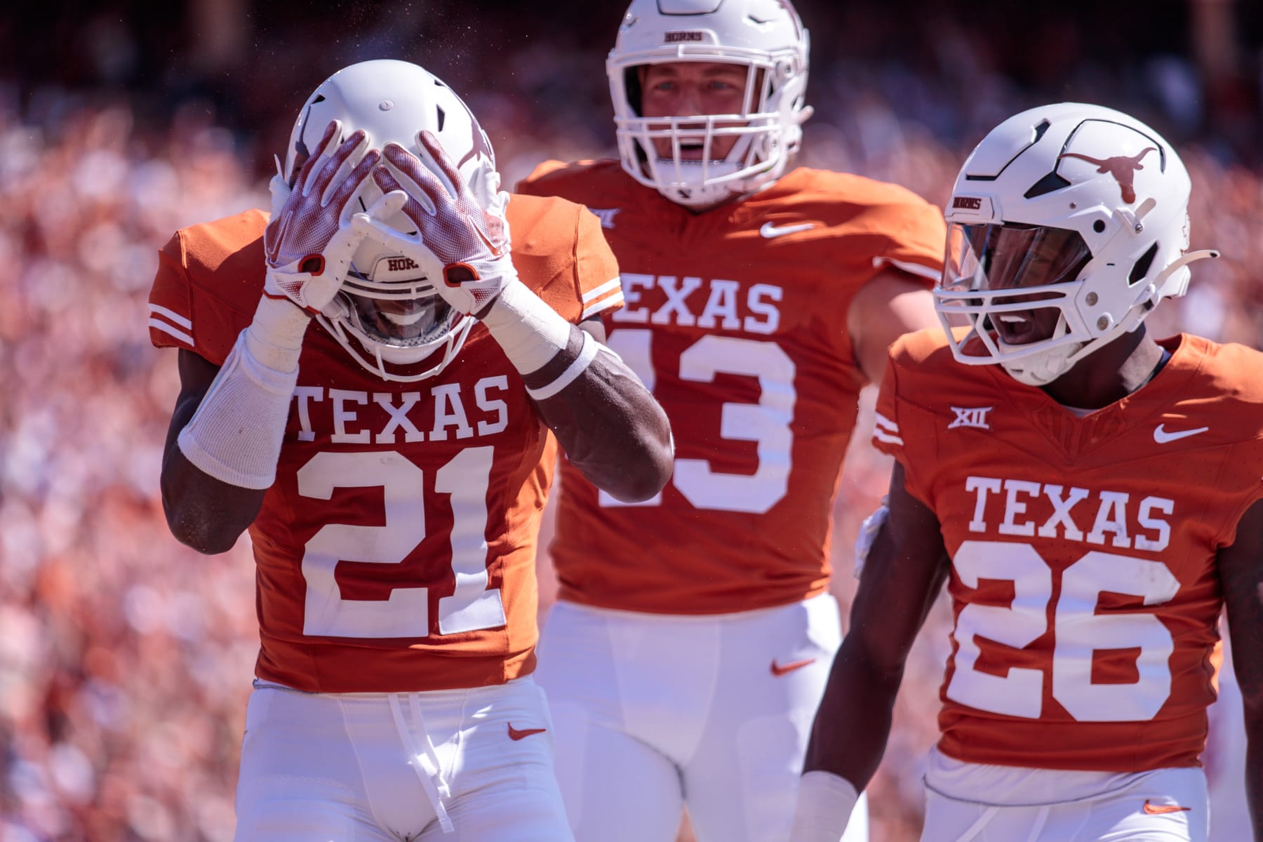 DALLAS, TX - OCTOBER 07: Texas Longhorns defensive back Kitan Crawford (21) reacts after missing an interception during the first half against the Oklahoma Sooners on October 7th, 2023 at Cotton Bowl Stadium in Dallas Texas. (Photo by William Purnell/Icon Sportswire via Getty Images)