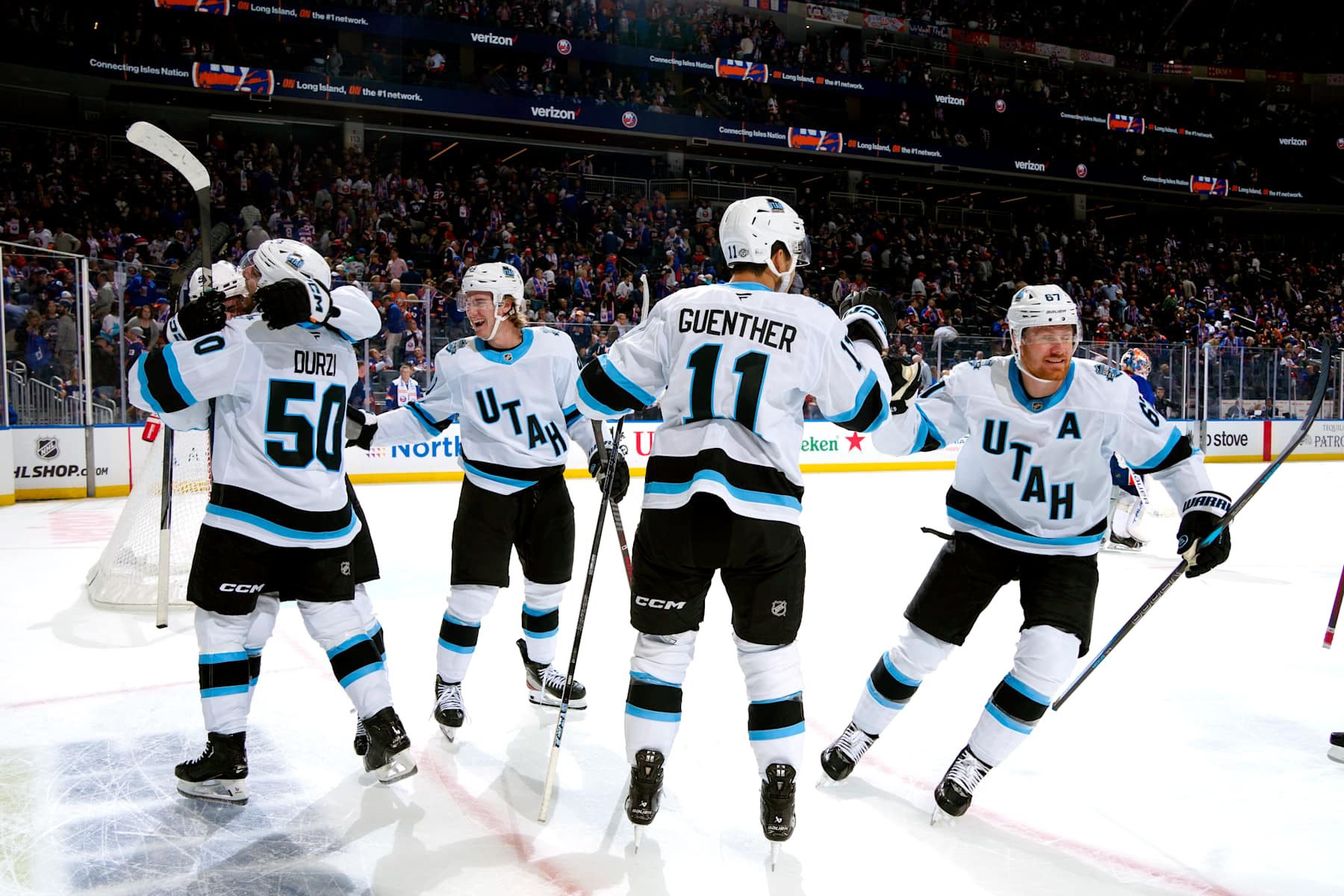 The Utah Hockey Club celebrates an OT win at MSG.