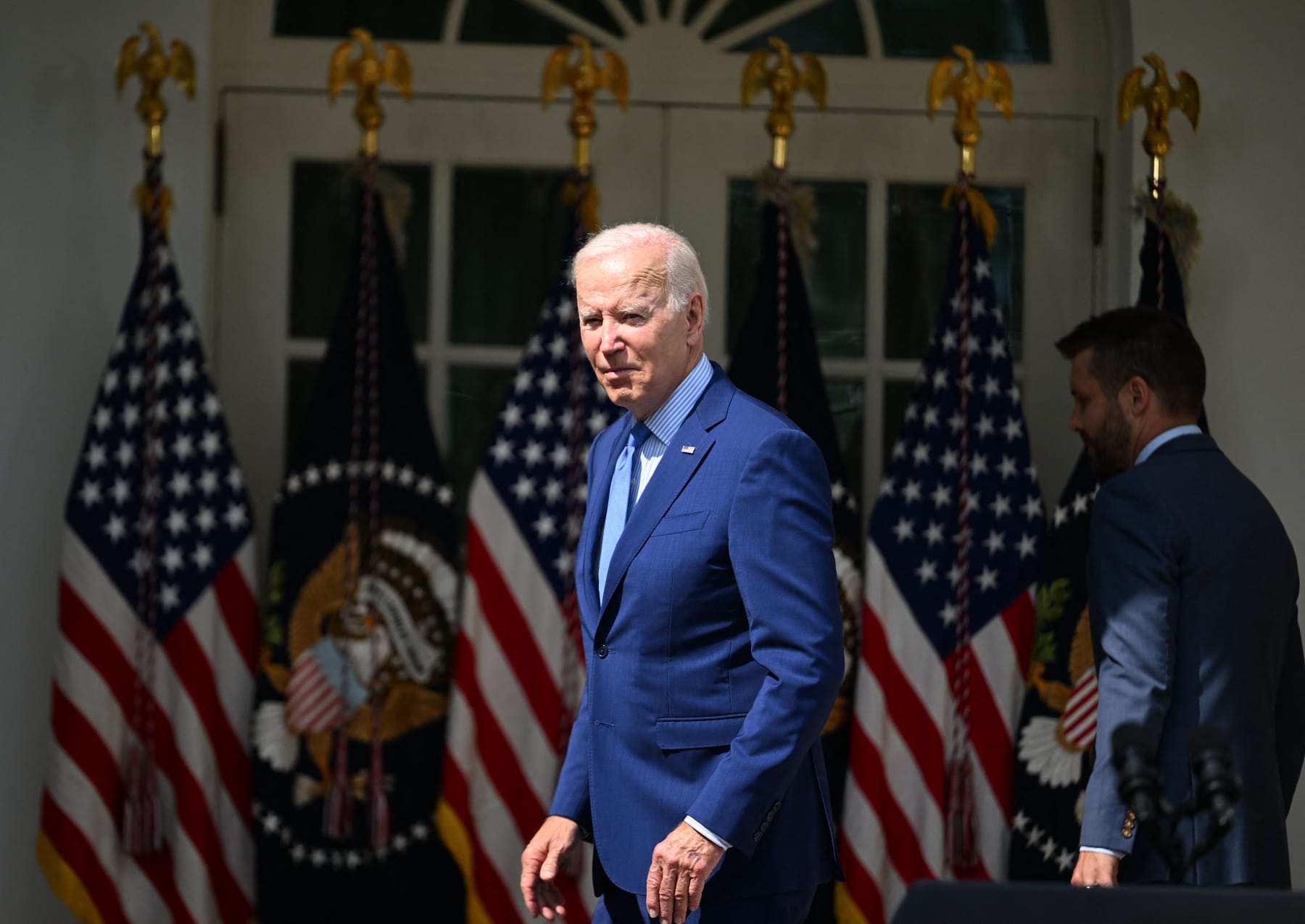 US President Joe Biden leaves after speaking about the railway labor agreement in the Rose Garden of the White House in Washington, DC, September 15, 2022. - Biden announced Thursday that railroad companies and unions had reached a tentative deal to avert a strike that had threatened to disrupt travel and supply chains. The agreement was reached after marathon talks at the Labor Department in Washington that began Wednesday and stretched late into the night. (Photo by Jim WATSON / AFP) (Photo by JIM WATSON/AFP via Getty Images)