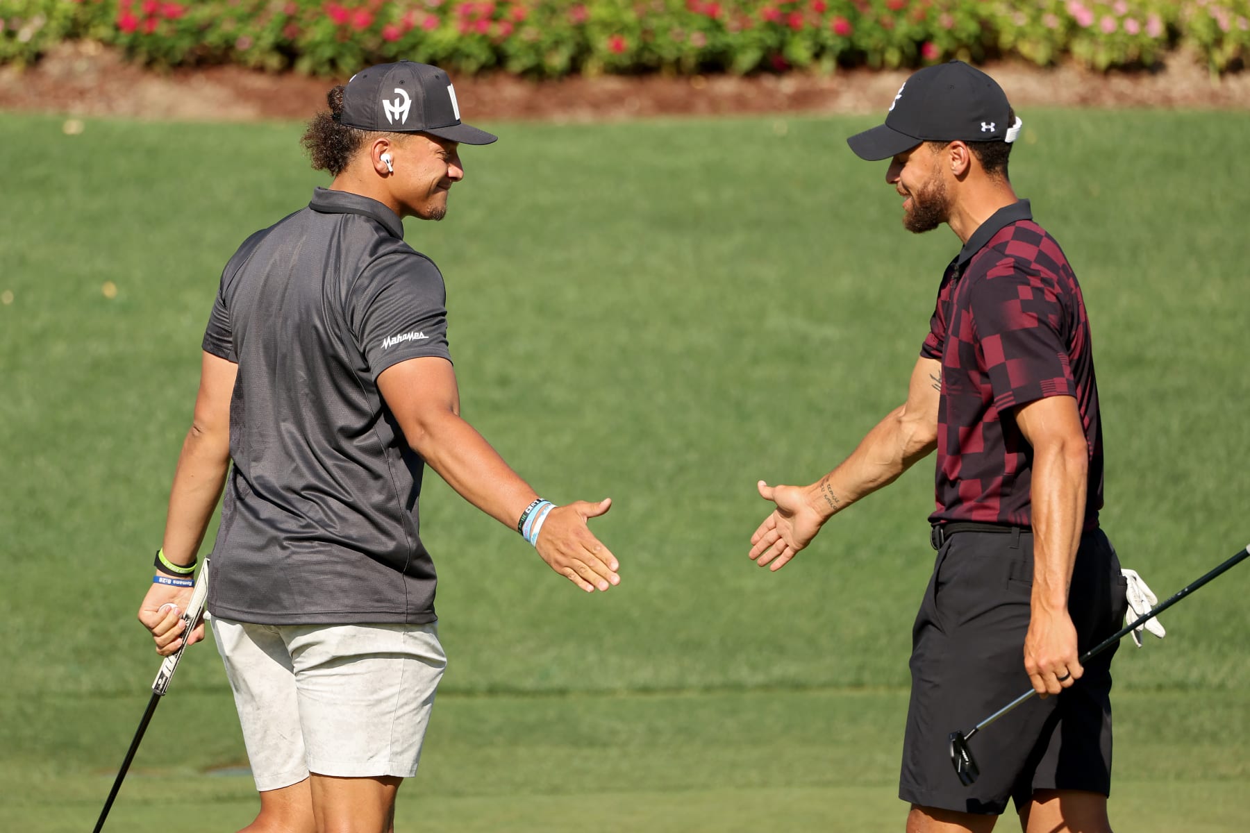 LAS VEGAS, NEVADA - JUNE 29: Patrick Mahomes (L) and Stephen Curry celebrate during Capital One's The Match VIII - Curry & Thompson vs. Mahomes & Kelce at Wynn Golf Club on June 29, 2023 in Las Vegas, Nevada. (Photo by Ezra Shaw/Getty Images for The Match)