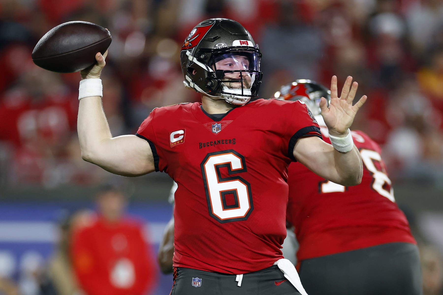 TAMPA, FLORIDA - JANUARY 15: Baker Mayfield #6 of the Tampa Bay Buccaneers throws a pass against the Philadelphia Eagles during the first quarter in the NFC Wild Card Playoffs at Raymond James Stadium on January 15, 2024 in Tampa, Florida. (Photo by Mike Ehrmann/Getty Images)