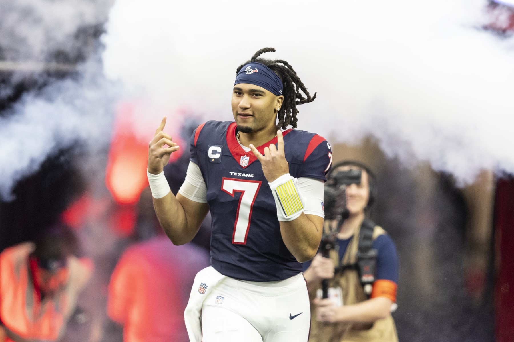 HOUSTON, TEXAS - JANUARY 13: C.J. Stroud #7 of the Houston Texans reacts as he takes the field prior to an NFL wild-card playoff football game between the Houston Texans and the Cleveland Browns at NRG Stadium on January 13, 2024 in Houston, Texas. (Photo by Michael Owens/Getty Images)