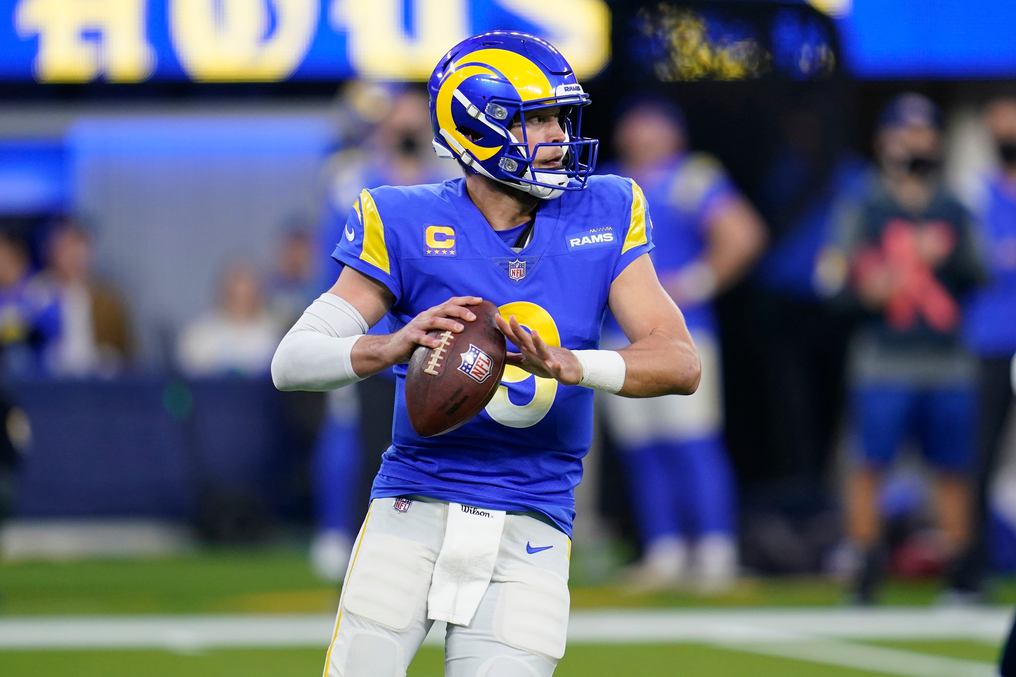 Los Angeles Rams quarterback Matthew Stafford throws during the first half of an NFL football game against the Seattle Seahawks Tuesday, Dec. 21, 2021, in Inglewood, Calif. (AP Photo/Ashley Landis)