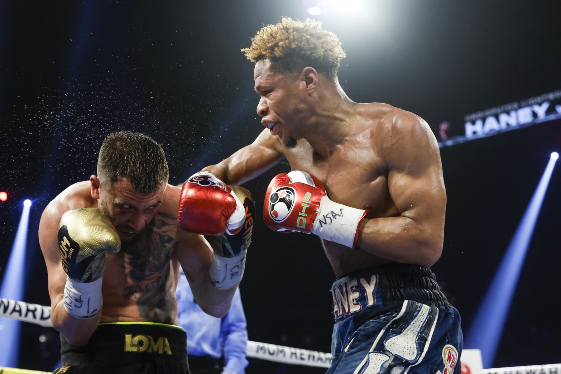 LAS VEGAS, NEVADA - MAY 20: Devin Haney exchanges punches with  Vasyl Lomachenko of Ukraine during their undisputed lightweight title bout at MGM Grand Garden Arena on May 20, 2023 in Las Vegas, Nevada. (Photo by Sarah Stier/Getty Images)