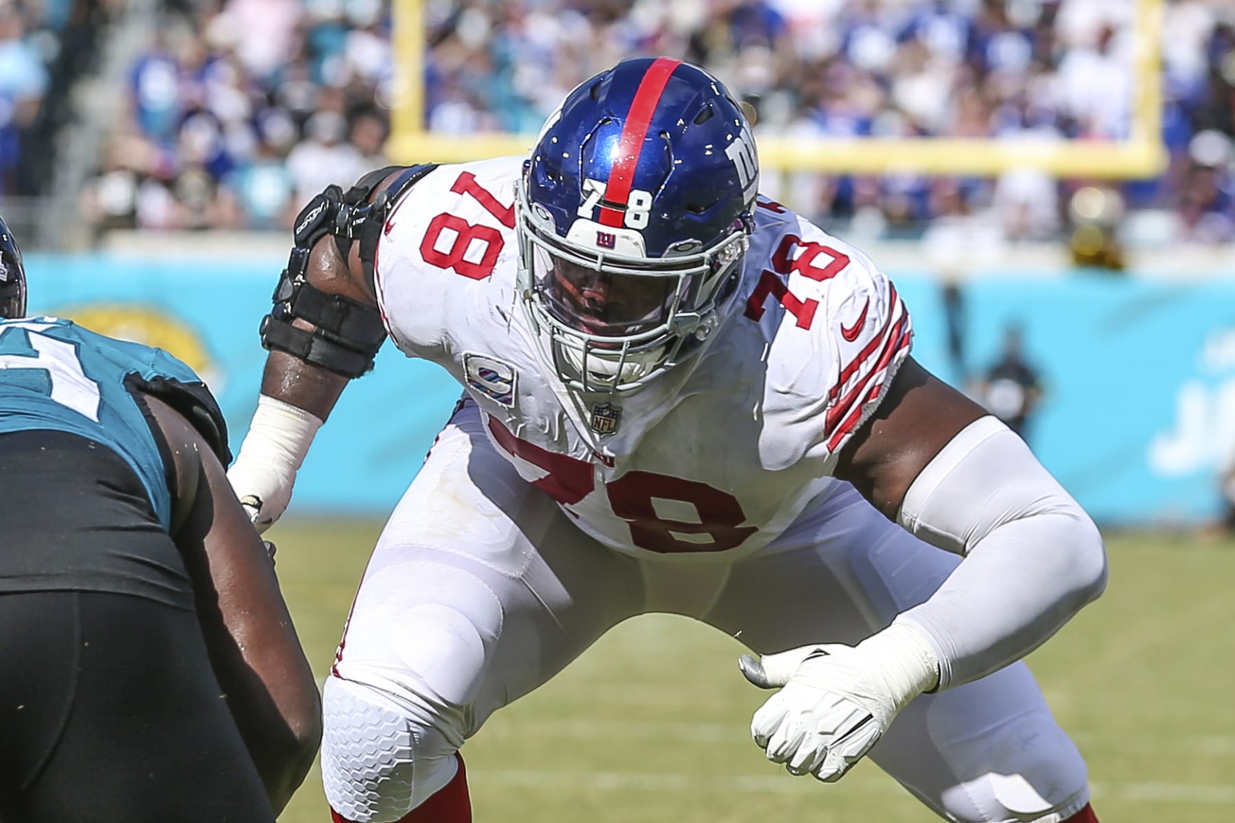 New York Giants offensive tackle Andrew Thomas (78) sets to block during an NFL football game against the Jacksonville Jaguars on Sunday, Oct. 23, 2022, in Jacksonville, Fla. (AP Photo/Gary McCullough) New York Giants offensive tackle Andrew Thomas (78) sets to block during an NFL football game against the Jacksonville Jaguars on Sunday, Oct. 23, 2022, in Jacksonville, Fla. (AP Photo/Gary McCullough)