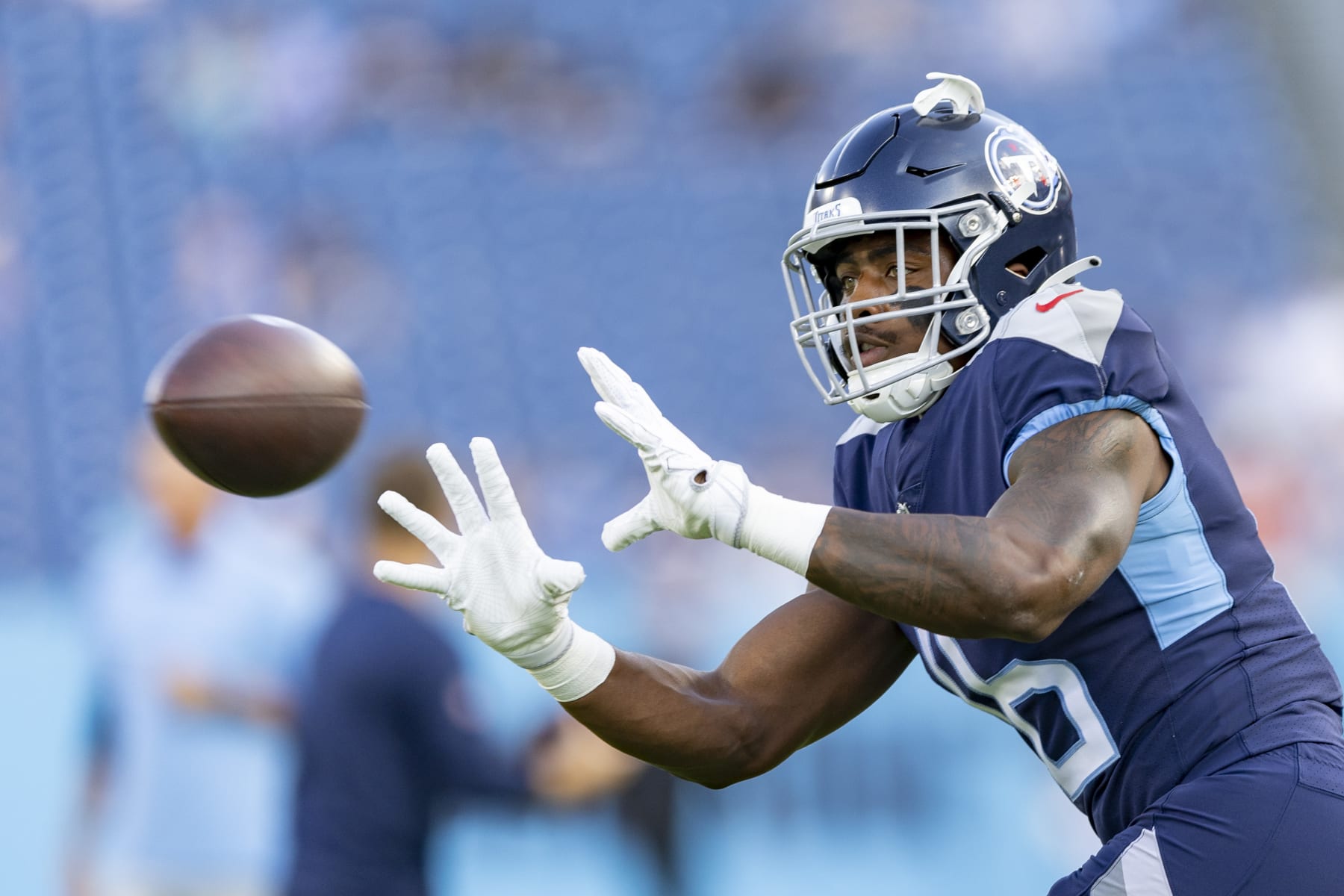 NASHVILLE, TENNESSEE - AUGUST 27: Treylon Burks #16 of the Tennessee Titans warms up before a preseason game against the Arizona Cardinals at Nissan Stadium on August 27, 2022 in Nashville, Tennessee. The Titans defeated the Cardinals 26-23.  (Photo by Wesley Hitt/Getty Images)