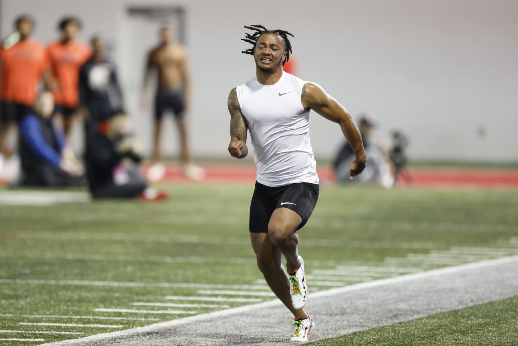 Ohio State football wide receiver Jaxon Smith-Njigba runs a drill at the school's NFL Pro Day in Columbus, Ohio, Wednesday, March 22, 2023. (AP Photo/Paul Vernon)