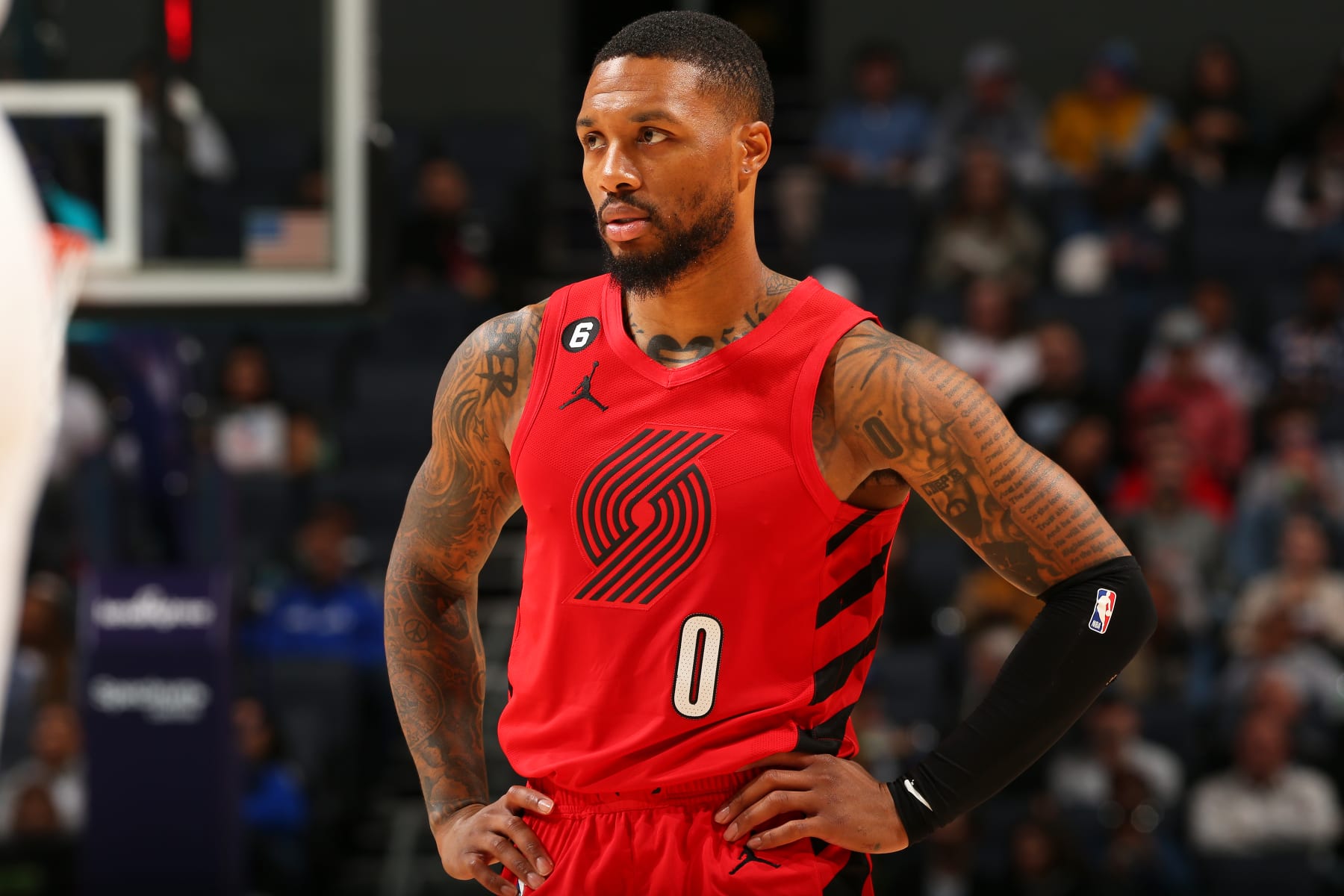 CHARLOTTE, NC - NOVEMBER 9: Damian Lillard #0 of the Portland Trail Blazers looks on during the game against the Charlotte Hornets on November 9, 2022 at Spectrum Center in Charlotte, North Carolina. NOTE TO USER: User expressly acknowledges and agrees that, by downloading and or using this photograph, User is consenting to the terms and conditions of the Getty Images License Agreement. Mandatory Copyright Notice: Copyright 2022 NBAE (Photo by Kent Smith/NBAE via Getty Images)