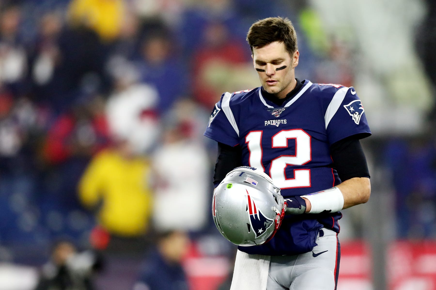 FOXBOROUGH, MASSACHUSETTS - JANUARY 04: Tom Brady #12 of the New England Patriots looks on in the AFC Wild Card Playoff game against the Tennessee Titans at Gillette Stadium on January 04, 2020 in Foxborough, Massachusetts. (Photo by Adam Glanzman/Getty Images)