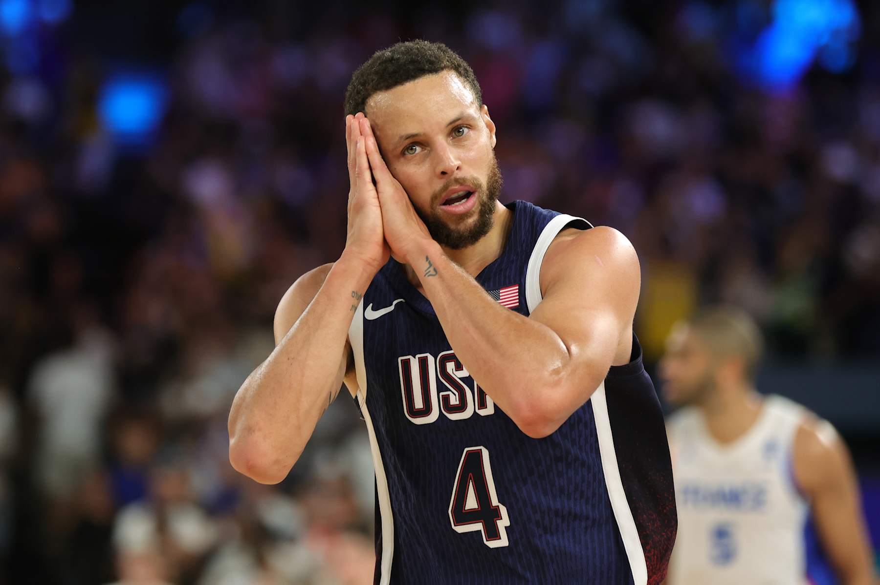 PARIS, FRANCE - AUGUST 10:  Stephen Curry of United States celebrates during the Men's Gold Medal game between France and United States on day fifteen of the Olympic Games Paris 2024 at Bercy Arena on August 10, 2024 in Paris, France. (Photo by Christina Pahnke - sampics/Getty Images)