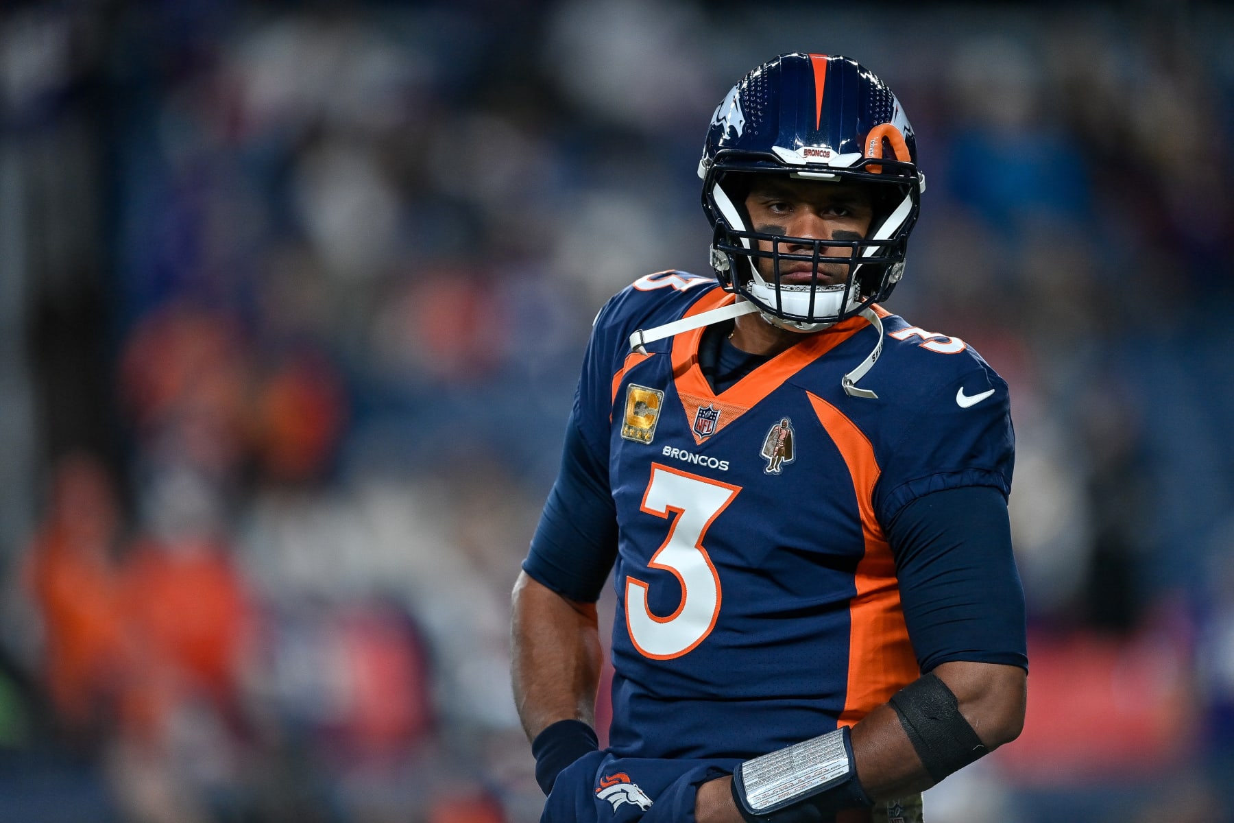DENVER, COLORADO - NOVEMBER 19:  Russell Wilson #3 of the Denver Broncos warms up before a game against the Minnesota Vikings at Empower Field at Mile High on November 19, 2023 in Denver, Colorado. (Photo by Dustin Bradford/Getty Images)