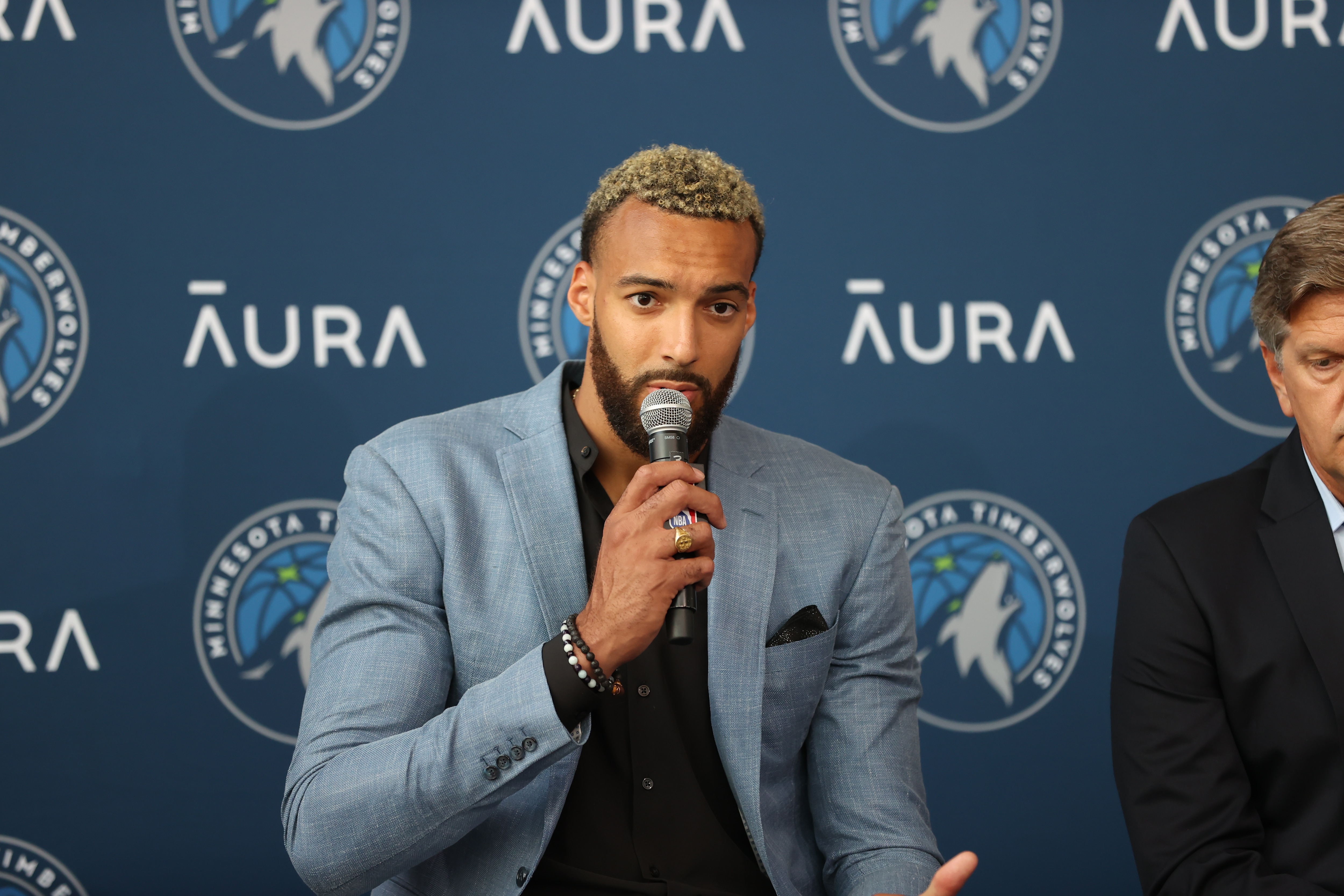 MINNEAPOLIS, MN - JULY 6: Rudy Gobert of the Minnesota Timberwolves talks to the media during the introductory draft press conference on July 6, 2022 at Target Center in Minneapolis, Minnesota.  NOTE TO USER: User expressly acknowledges and agrees that, by downloading and or using this Photograph, user is consenting to the terms and conditions of the Getty Images License Agreement. Mandatory Copyright Notice: Copyright 2022 NBAE (Photo by David Sherman/NBAE via Getty Images)