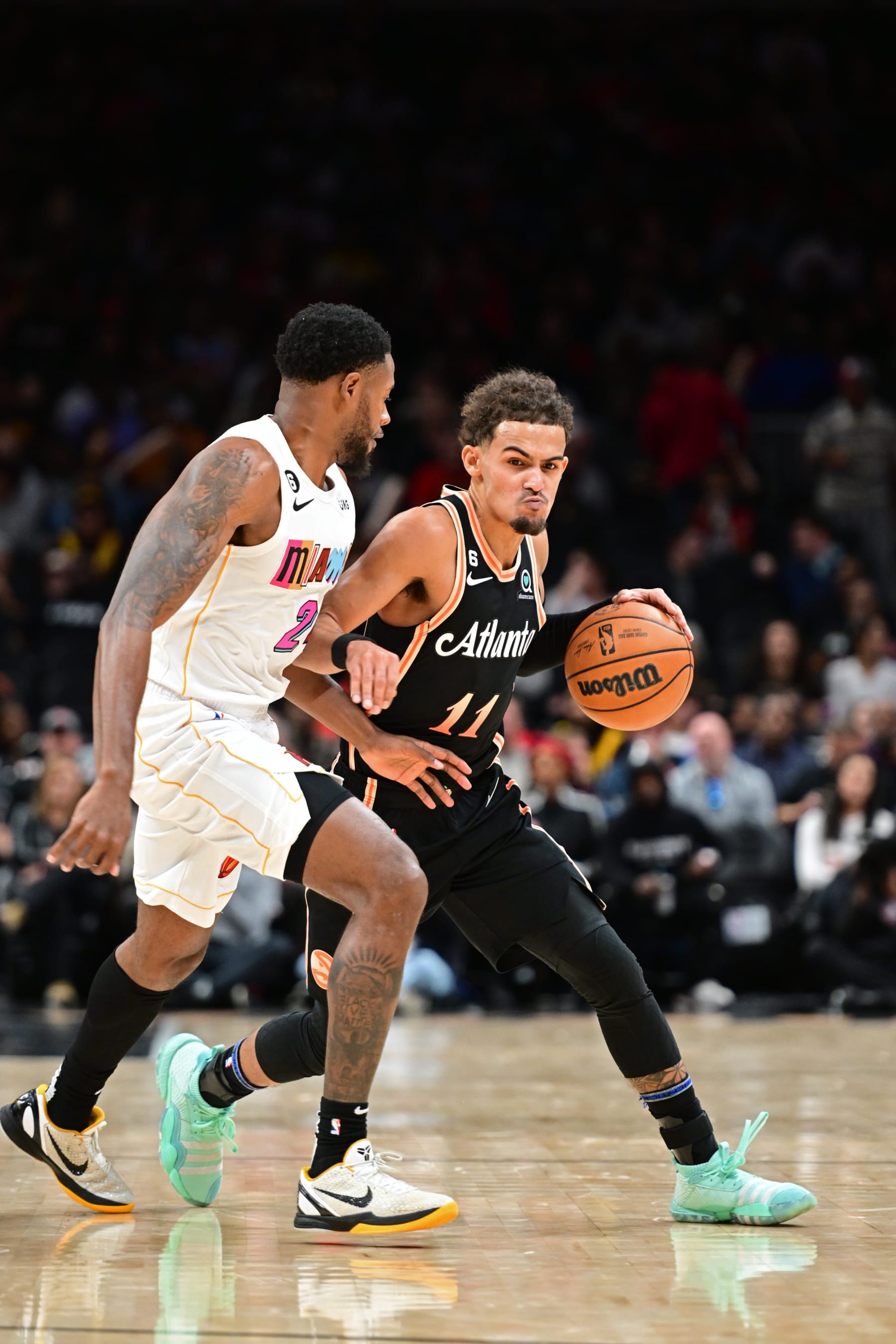 ATLANTA, GA - NOVEMBER 27: Trae Young #11 of the Atlanta Hawks drives to the basket during the game against the Miami Heat on November 27, 2022 at State Farm Arena in Atlanta, Georgia.  NOTE TO USER: User expressly acknowledges and agrees that, by downloading and/or using this Photograph, user is consenting to the terms and conditions of the Getty Images License Agreement. Mandatory Copyright Notice: Copyright 2022 NBAE (Photo by Adam Hagy/NBAE via Getty Images)