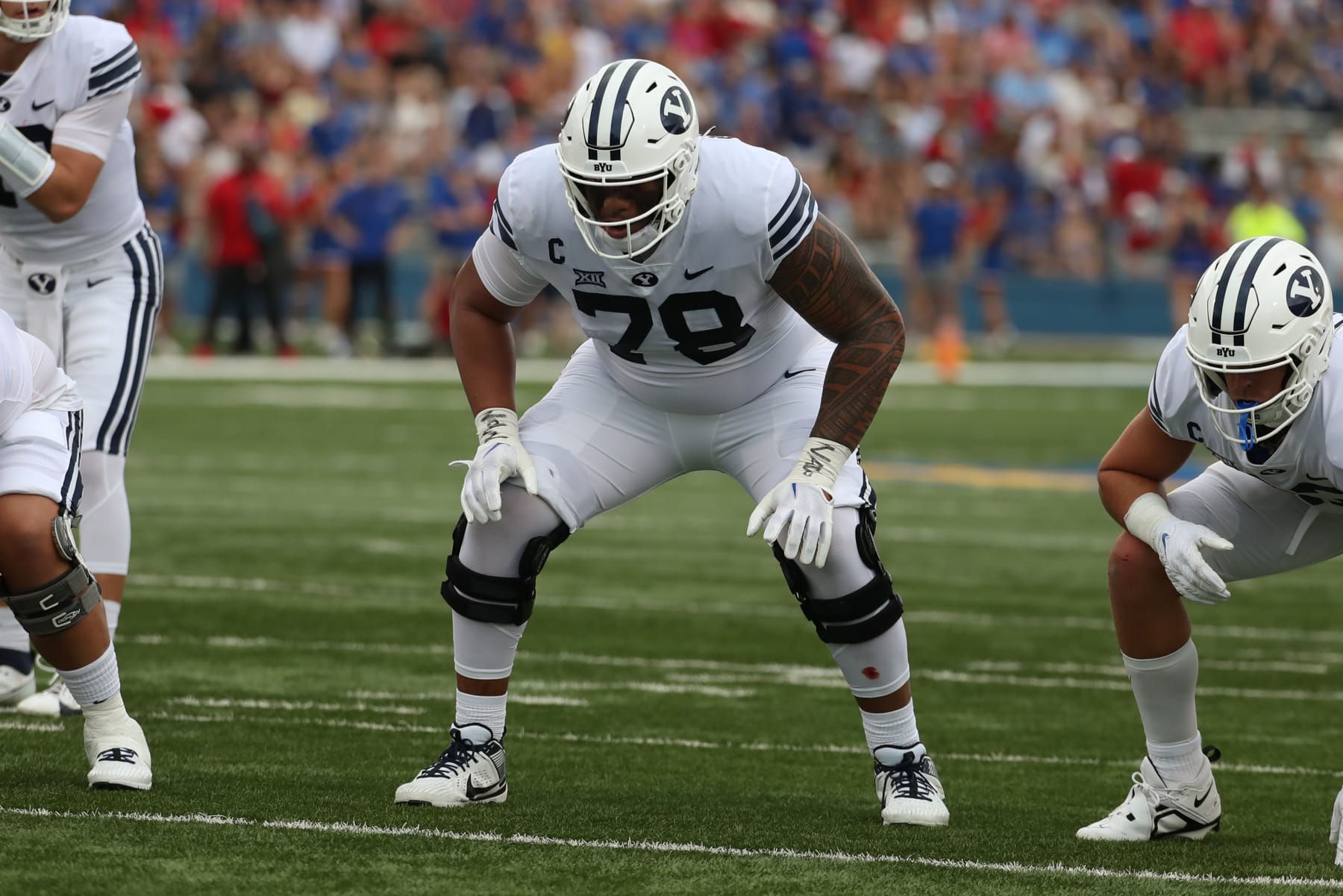 LAWRENCE, KS - SEPTEMBER 23: Brigham Young Cougars offensive lineman Kingsley Suamataia (78) during a Big 12 football game between the Brigham Young Cougars and Kansas Jayhawks on Sep 23, 2023 at David Booth Memorial Stadium in Lawrence, KS. (Photo by Scott Winters/Icon Sportswire via Getty Images)