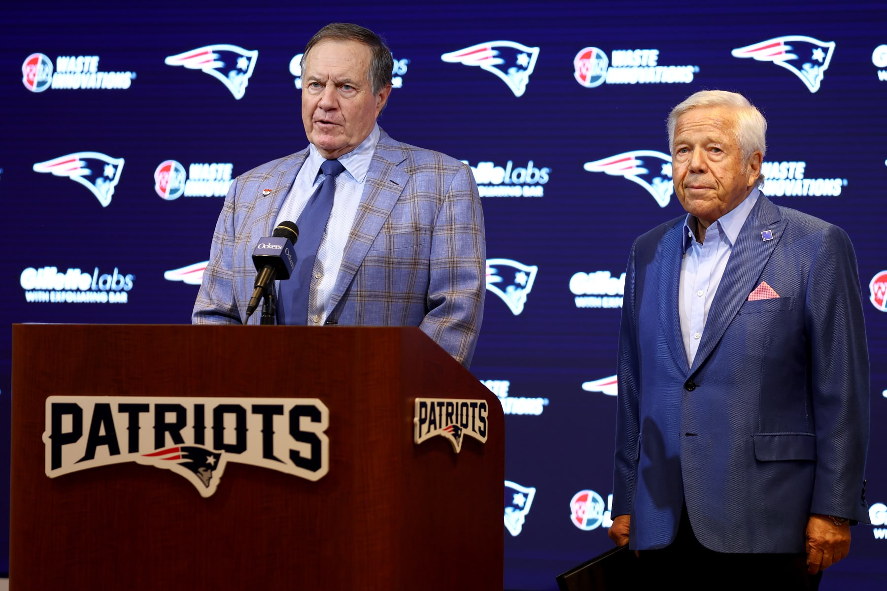 FOXBOROUGH, MASSACHUSETTS - JANUARY 11: Head coach Bill Belichick (L) of the New England Patriots speaks to the media as owner Robert Kraft (R) looks on during a press conference at Gillette Stadium on January 11, 2024 in Foxborough, Massachusetts. Belichick announced he is stepping down as head coach after 24 seasons with the team. (Photo by Maddie Meyer/Getty Images)