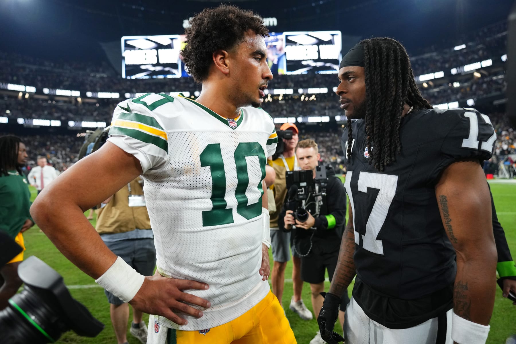 LAS VEGAS, NEVADA - OCTOBER 09: Jordan Love #10 of the Green Bay Packers talks with Davante Adams #17 of the Las Vegas Raiders following the game at Allegiant Stadium on October 09, 2023 in Las Vegas, Nevada. (Photo by Chris Unger/Getty Images)