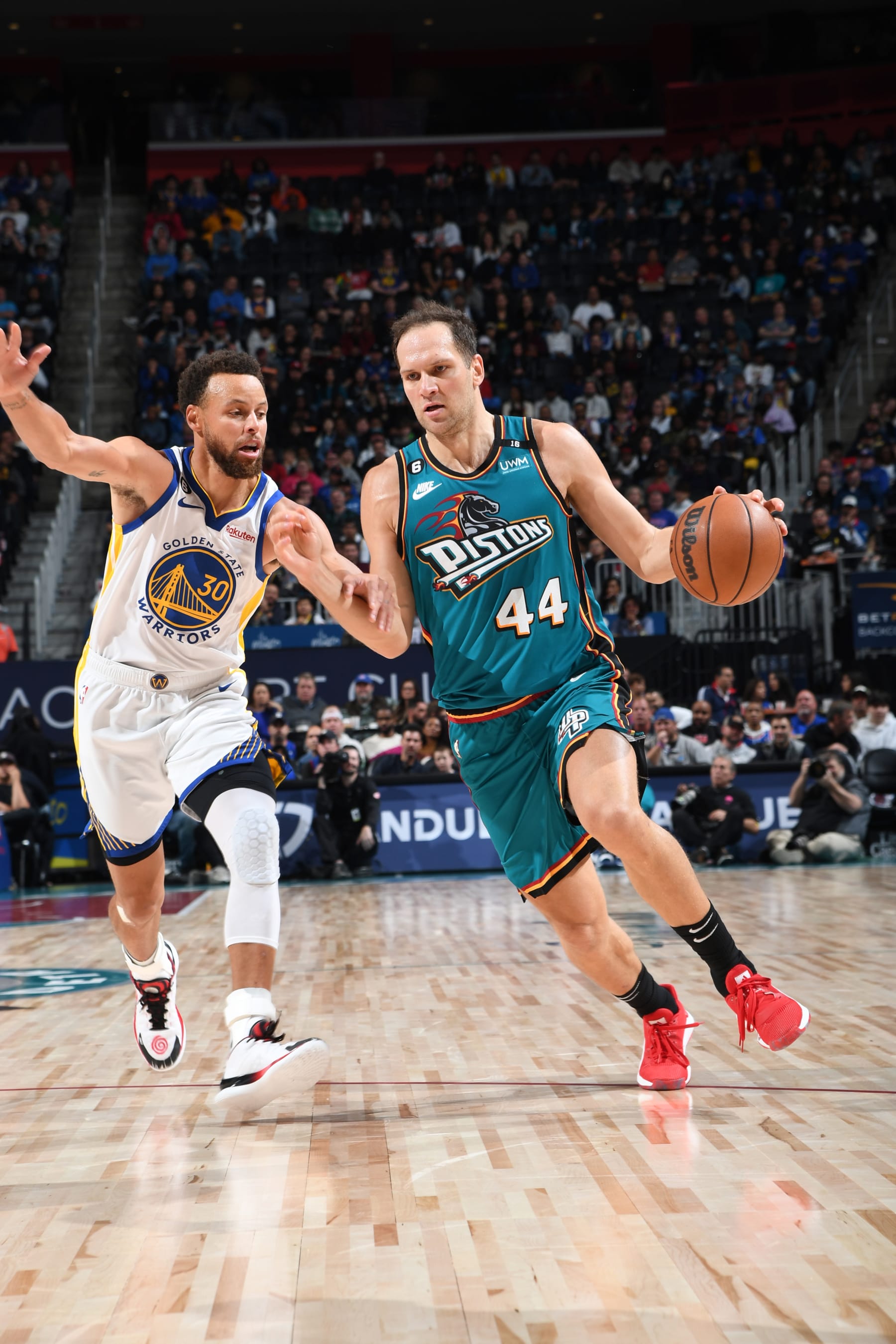 DETROIT, MI - OCTOBER 30: Bojan Bogdanovic #44 of the Detroit Pistons dribbles the ball during the game against the Golden State Warriors on October 30, 2022 at Little Caesars Arena in Detroit, Michigan. NOTE TO USER: User expressly acknowledges and agrees that, by downloading and/or using this photograph, User is consenting to the terms and conditions of the Getty Images License Agreement. Mandatory Copyright Notice: Copyright 2022 NBAE (Photo by Chris Schwegler/NBAE via Getty Images)