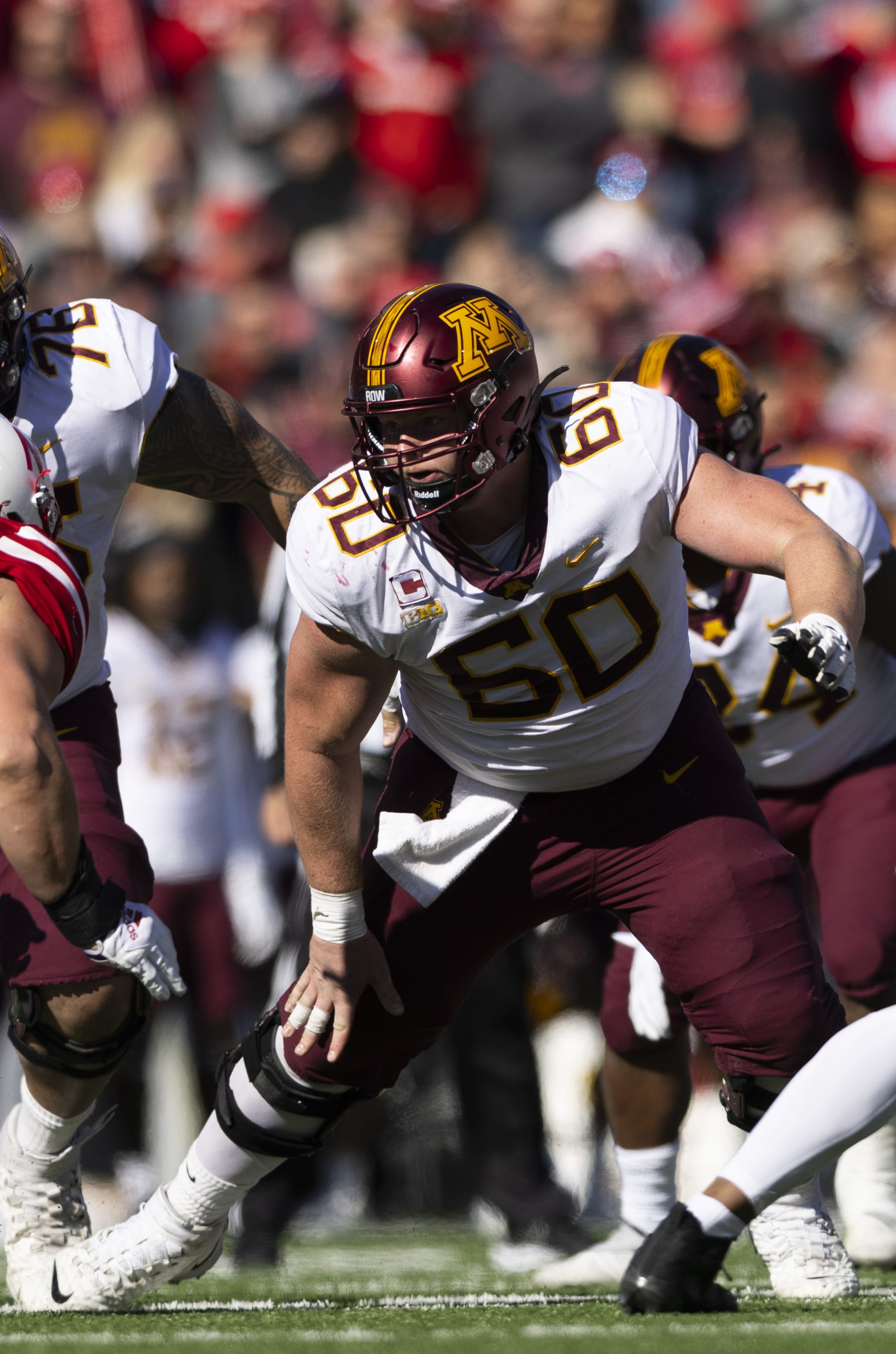 Minnesota offensive lineman John Michael Schmitz (60) plays against Nebraska during the second half of an NCAA college football game Saturday, Nov. 5, 2022, in Lincoln, Neb. Minnesota defeated Nebraska 20-13. (AP Photo/Rebecca S. Gratz)