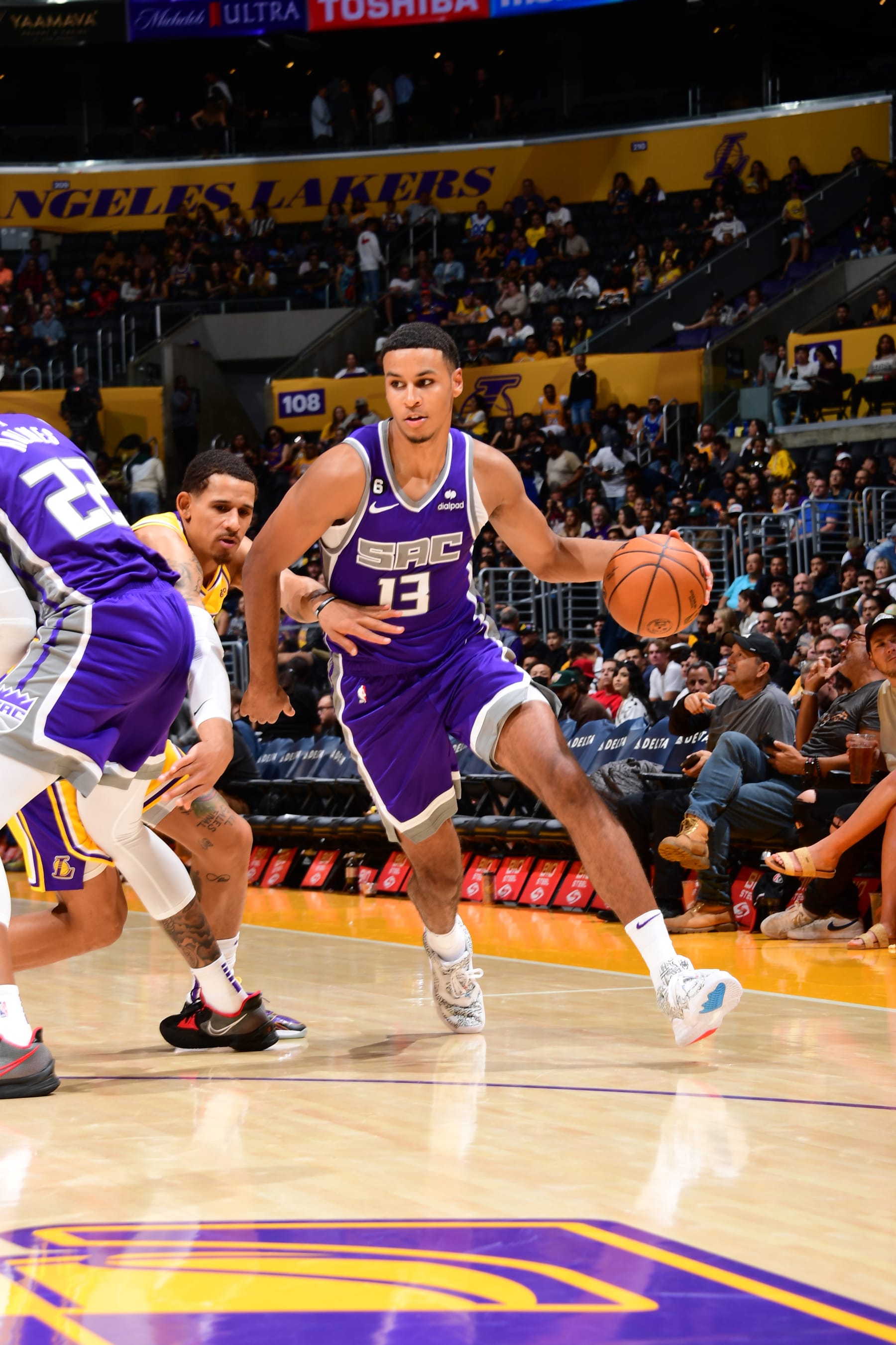 LOS ANGELES, CA - OCTOBER 3: Keegan Murray #13 of the Sacramento Kings dribbles the ball against the Los Angeles Lakers during a preseason game on October 3, 2022 at Crypto.com Arena in Los Angeles, California. NOTE TO USER: User expressly acknowledges and agrees that, by downloading and/or using this Photograph, user is consenting to the terms and conditions of the Getty Images License Agreement. Mandatory Copyright Notice: Copyright 2022 NBAE (Photo by Adam Pantozzi/NBAE via Getty Images)