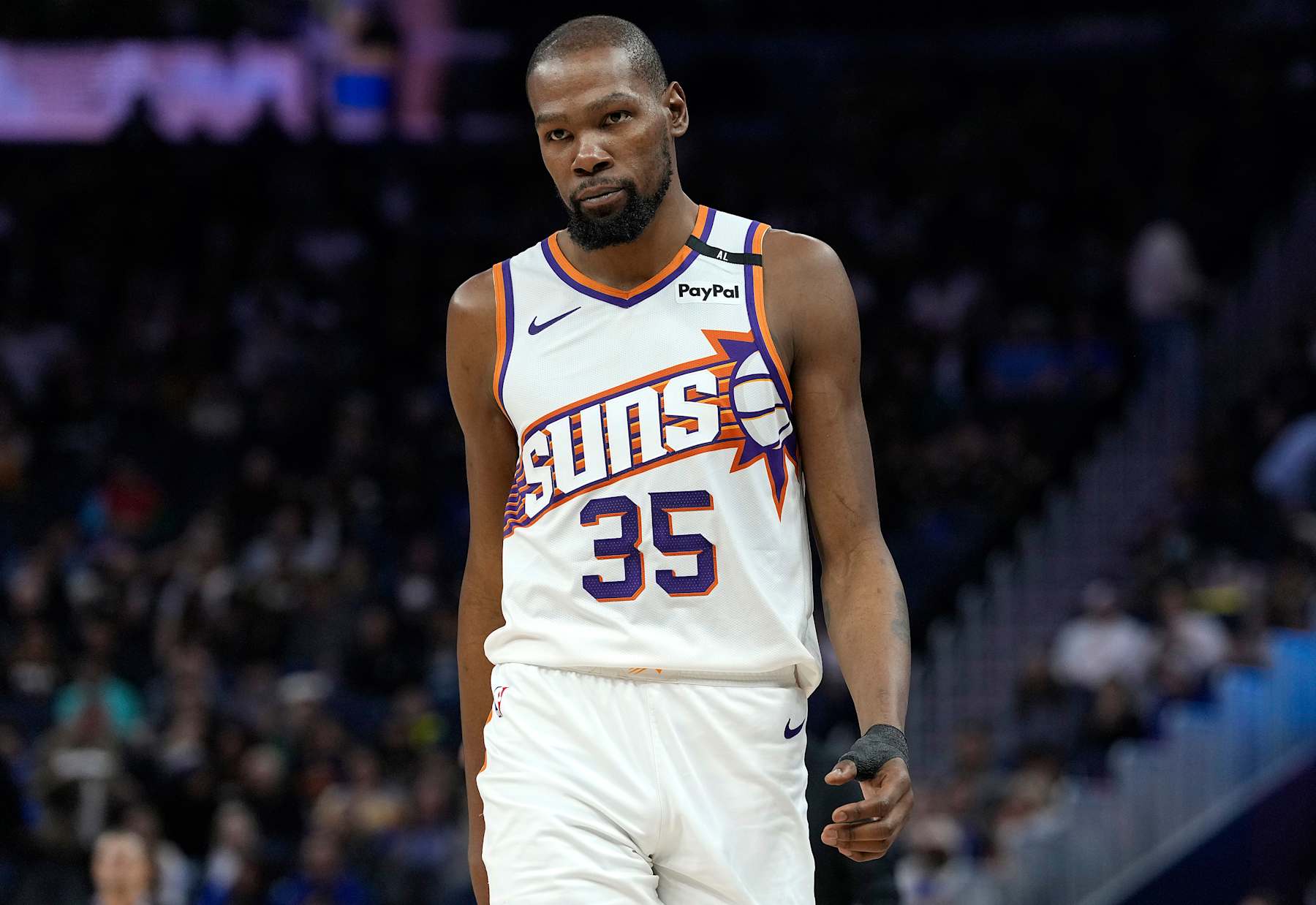 SAN FRANCISCO, CALIFORNIA - JANUARY 31: Kevin Durant #35 of the Phoenix Suns looks on against the Golden State Warriors during the second half of an NBA basketball game at Chase Center on January 31, 2025 in San Francisco, California. NOTE TO USER: User expressly acknowledges and agrees that, by downloading and or using this photograph, User is consenting to the terms and conditions of the Getty Images License Agreement. (Photo by Thearon W. Henderson/Getty Images)