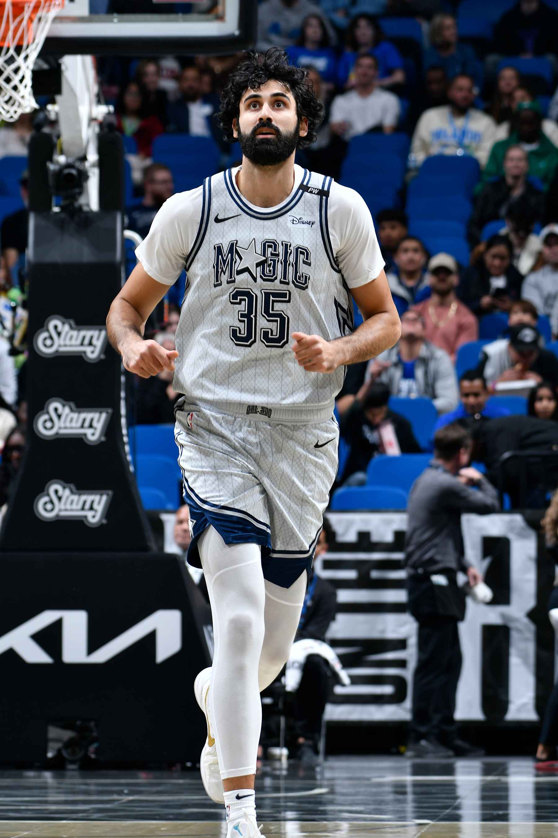 ORLANDO, FL - NOVEMBER 23: Goga Bitadze #35 of the Orlando Magic runs up the court during the game against the Detroit Pistons on November 23, 2024 at Kia Center in Orlando, Florida. NOTE TO USER: User expressly acknowledges and agrees that, by downloading and or using this photograph, User is consenting to the terms and conditions of the Getty Images License Agreement. Mandatory Copyright Notice: Copyright 2024 NBAE (Photo by Fernando Medina/NBAE via Getty Images)