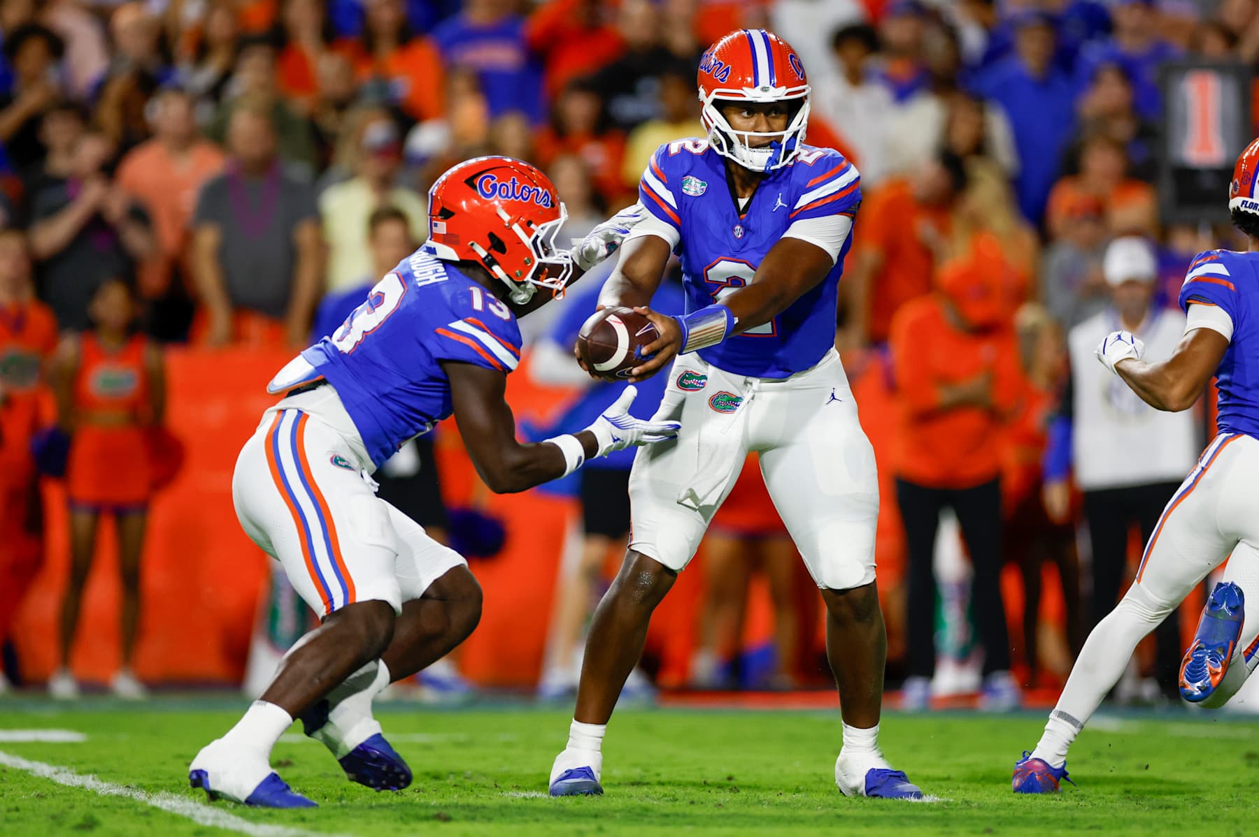 GAINESVILLE, FL - OCTOBER 19: Florida Gators quarterback DJ Lagway (2) hands off to Florida Gators running back Jadan Baugh (13) during the game between the Florida Gators and the Kentucky Wildcats on October 19, 2024 at Ben Hill Griffin Stadium in Gainesville, Fl. (Photo by David Rosenblum/Icon Sportswire via Getty Images)