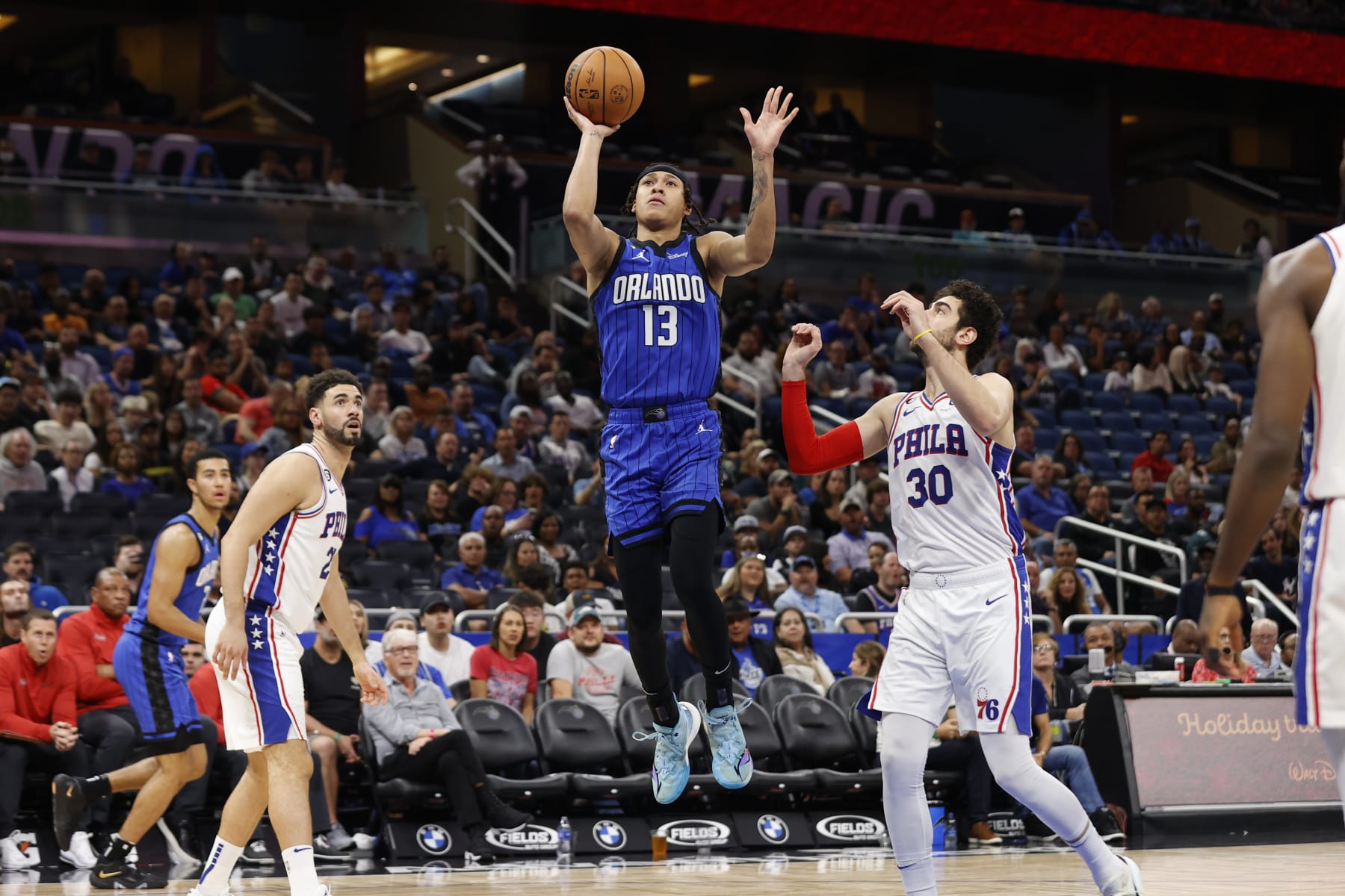 Orlando Magic guard R.J. Hampton (13) shoots the ball against the Philadelphia 76ers during the second half of an NBA basketball game, Sunday, Nov. 27, 2022, in Orlando, Fla. (AP Photo/Scott Audette)