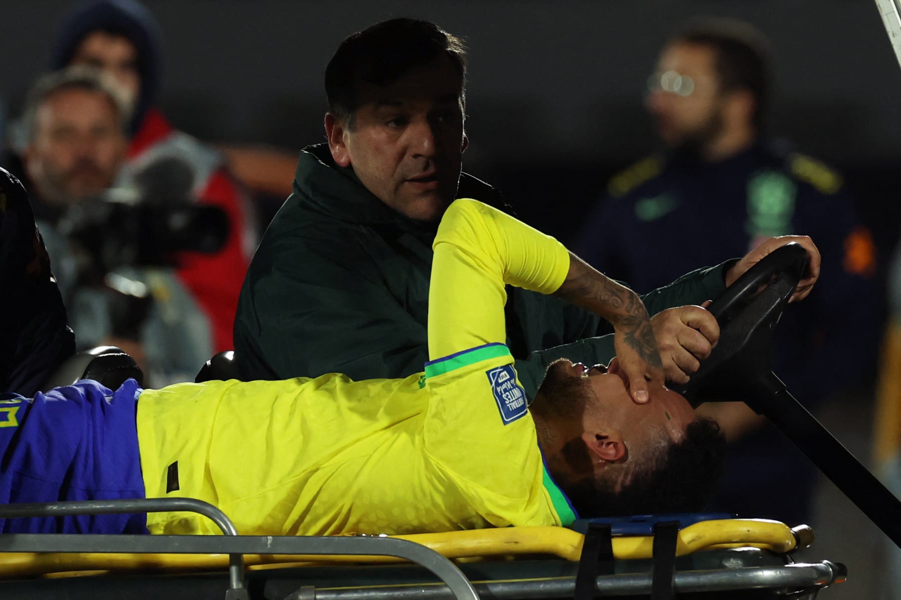 Brazil's forward Neymar leaves the field after an injury during the 2026 FIFA World Cup South American qualification football match between Uruguay and Colombia at the Centenario Stadium in Montevideo on October 17, 2023. (Photo by Pablo PORCIUNCULA / AFP) (Photo by PABLO PORCIUNCULA/AFP via Getty Images)