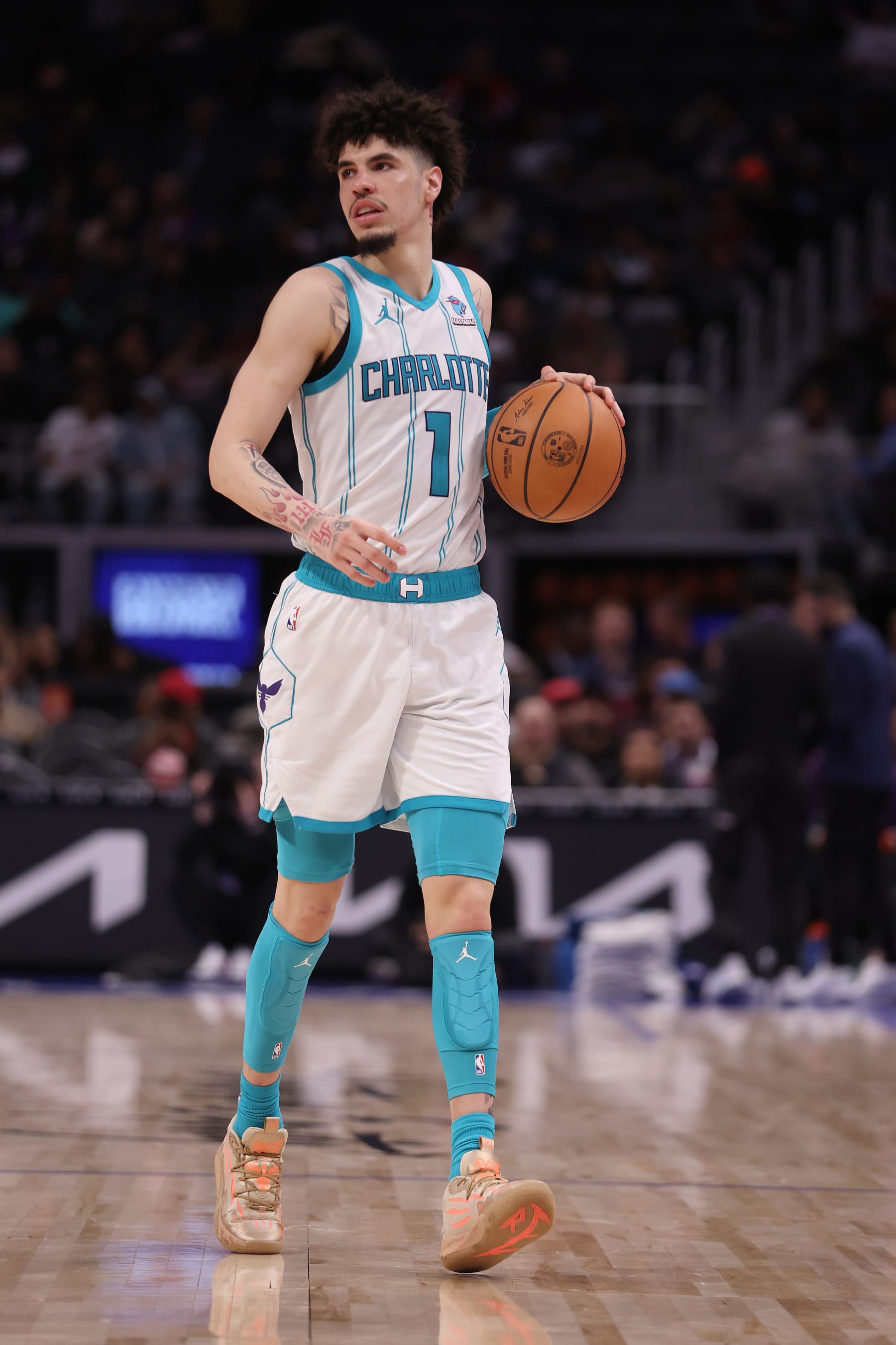 DETROIT, MICHIGAN - JANUARY 24: LaMelo Ball #1 of the Charlotte Hornets plays against Detroit Pistons at Little Caesars Arena on January 24, 2024 in Detroit, Michigan. NOTE TO USER: User expressly acknowledges and agrees that, by downloading and or using this photograph, User is consenting to the terms and conditions of the Getty Images License  (Photo by Gregory Shamus/Getty Images)