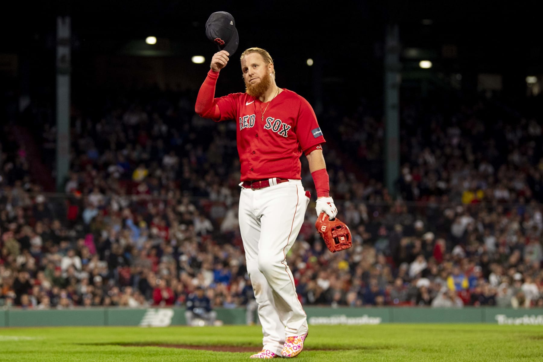 BOSTON, MA - SEPTEMBER 27: Justin Turner #2 of the Boston Red Sox reacts as he is removed from the game in the sixth inning against the Tampa Bay Rays on September 27, 2023 at Fenway Park in Boston, Massachusetts. (Photo by Billie Weiss/Boston Red Sox/Getty Images)
