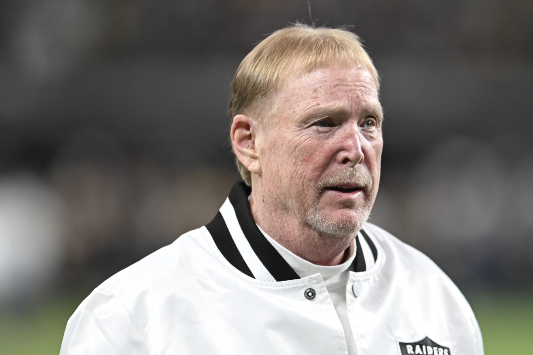 LAS VEGAS, NEVADA - OCTOBER 09: Las Vegas Raiders owner and managing general partner Mark Davis exits the field before the game against the Green Bay Packers at Allegiant Stadium on October 09, 2023 in Las Vegas, Nevada. (Photo by Candice Ward/Getty Images)