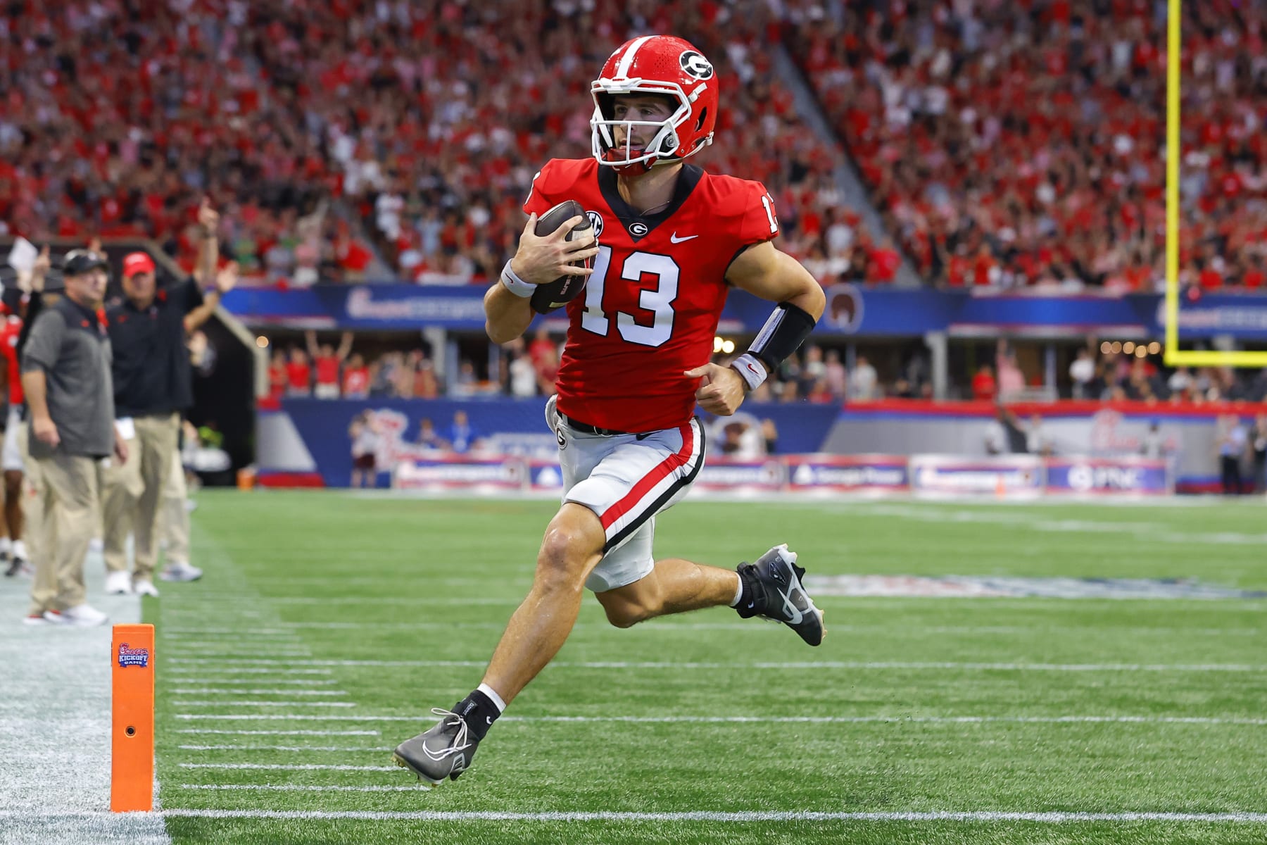 ATLANTA, GA - SEPTEMBER 03: Stetson Bennett #13 of the Georgia Bulldogs rushes in for a touchdown during the first half against the Oregon Ducks at Mercedes-Benz Stadium on September 3, 2022 in Atlanta, Georgia. (Photo by Todd Kirkland/Getty Images)