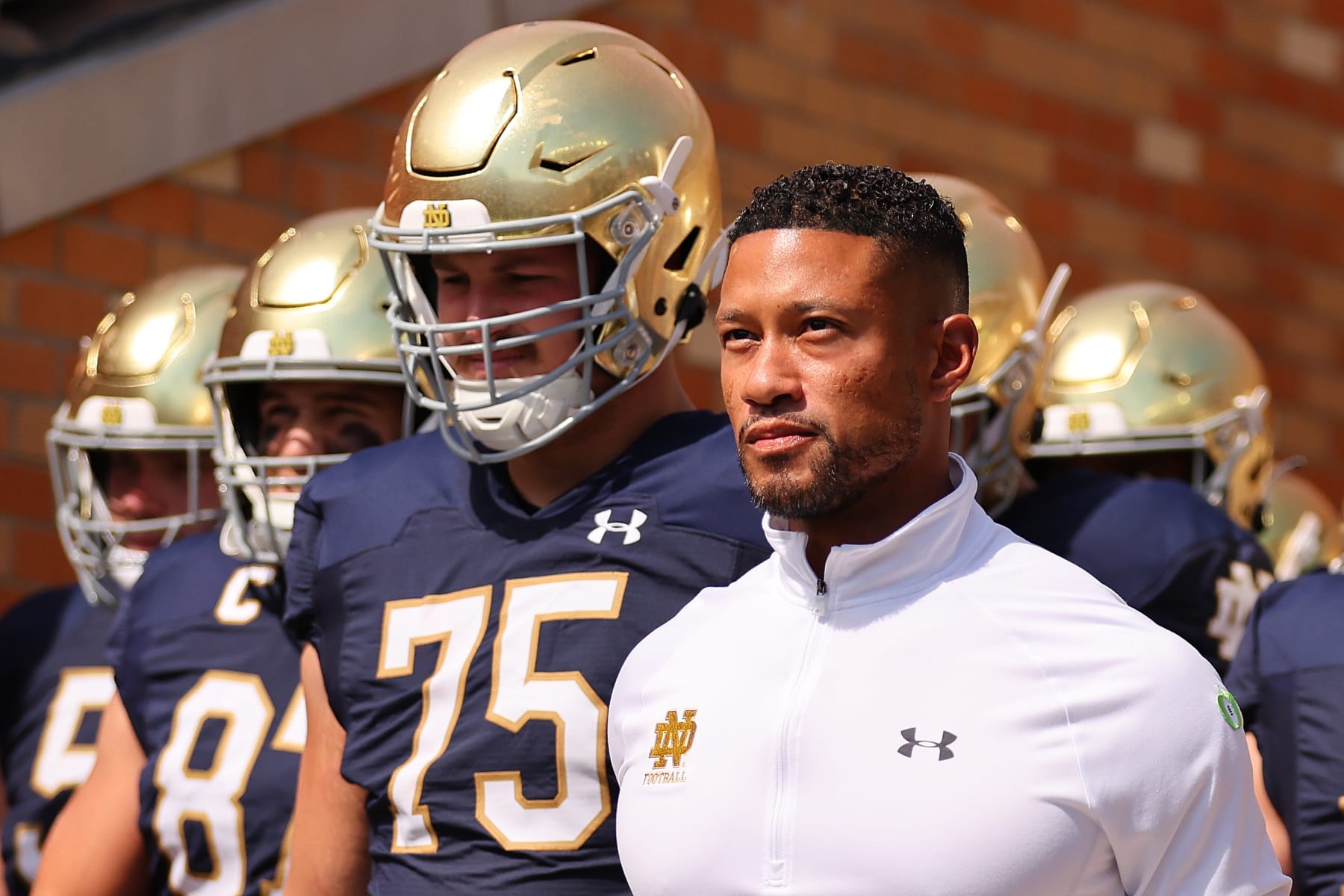 SOUTH BEND, INDIANA - SEPTEMBER 10: Head coach Marcus Freeman of the Notre Dame Fighting Irish takes the field prior to the game against the Marshall Thundering Herd at Notre Dame Stadium on September 10, 2022 in South Bend, Indiana. (Photo by Michael Reaves/Getty Images)