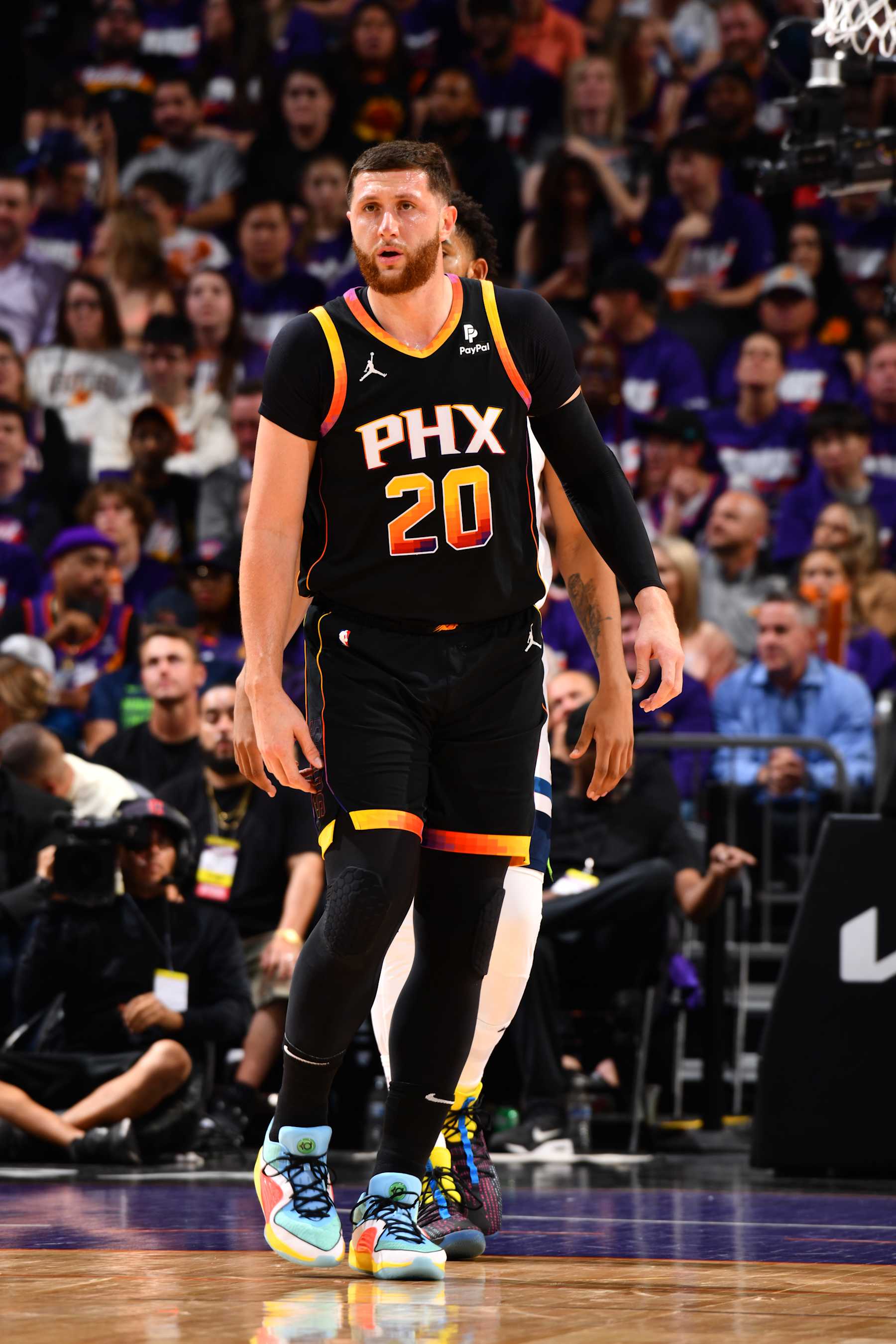 PHOENIX, AZ - APRIL 26:  Jusuf Nurkic #20 of the Phoenix Suns looks on during the game against the Minnesota Timberwolves during Round 1 Game 3 of the 2024 NBA Playoffs on April 26, 2024 at Footprint Center in Phoenix, Arizona. NOTE TO USER: User expressly acknowledges and agrees that, by downloading and or using this photograph, user is consenting to the terms and conditions of the Getty Images License Agreement. Mandatory Copyright Notice: Copyright 2024 NBAE (Photo by Barry Gossage/NBAE via Getty Images)