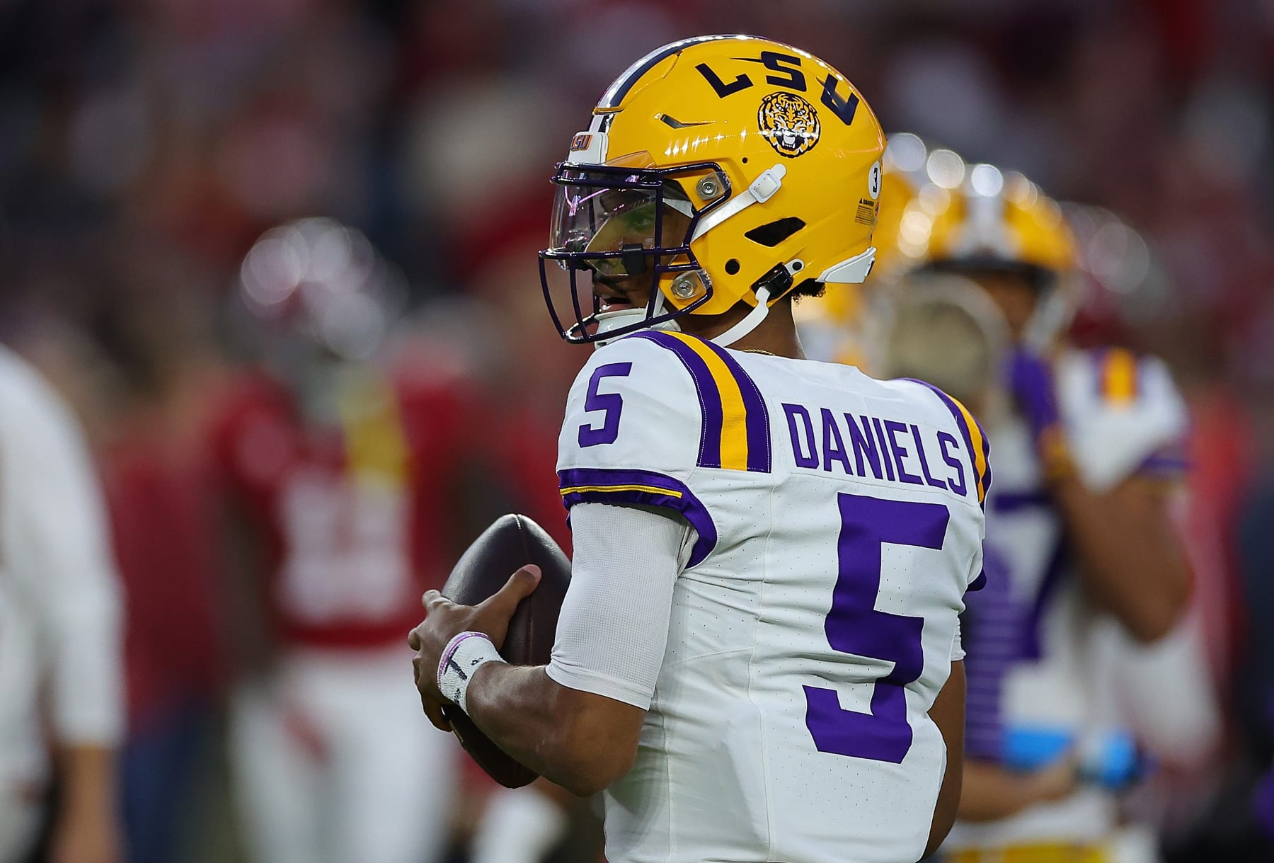 TUSCALOOSA, ALABAMA - NOVEMBER 04:  Jayden Daniels #5 of the LSU Tigers warms up prior to facing the Alabama Crimson Tide at Bryant-Denny Stadium on November 04, 2023 in Tuscaloosa, Alabama.  (Photo by Kevin C. Cox/Getty Images)