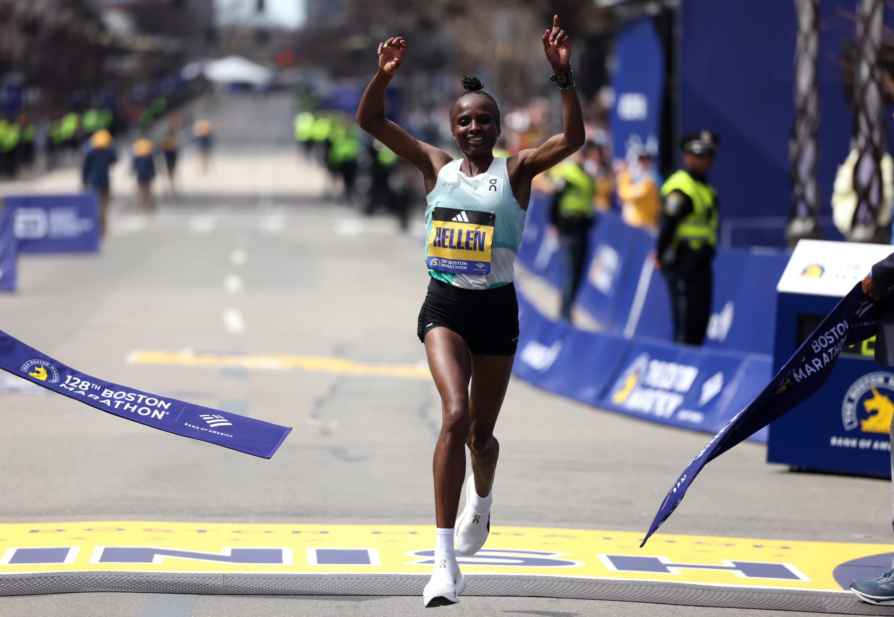 Boston, MA - April 15: Hellen Obiri reacted as she crossed the finish line to win the women's division of the Boston Marathon. (Photo by Jessica Rinaldi/The Boston Globe via Getty Images)
