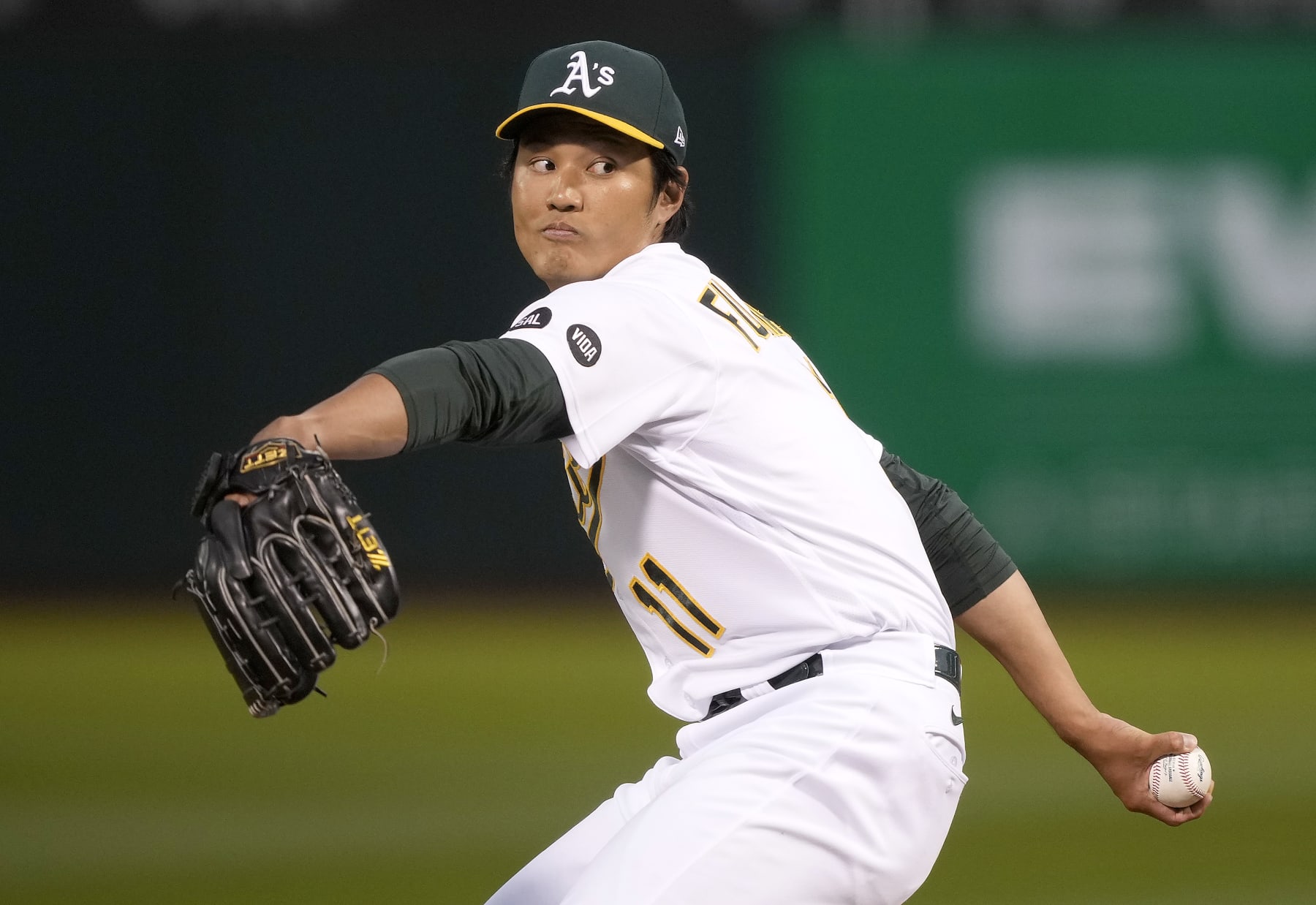OAKLAND, CALIFORNIA - JUNE 30: Shintaro Fujinami #11 of the Oakland Athletics pitches against the Chicago White Sox in the top of the seventh inning at RingCentral Coliseum on June 30, 2023 in Oakland, California. (Photo by Thearon W. Henderson/Getty Images)