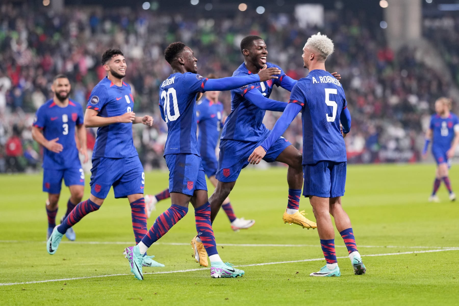 AUSTIN, TX - NOVEMBER 16: Miles Robinson #12 of USA scores a goal and celebrates with teammates during a Concacaf Nations League game between Trinidad and Tobago and USMNT at Q2 Stadium on November 16, 2023 in Austin, Texas. (Photo by Robin Alam/ISI Photos/Getty Images)