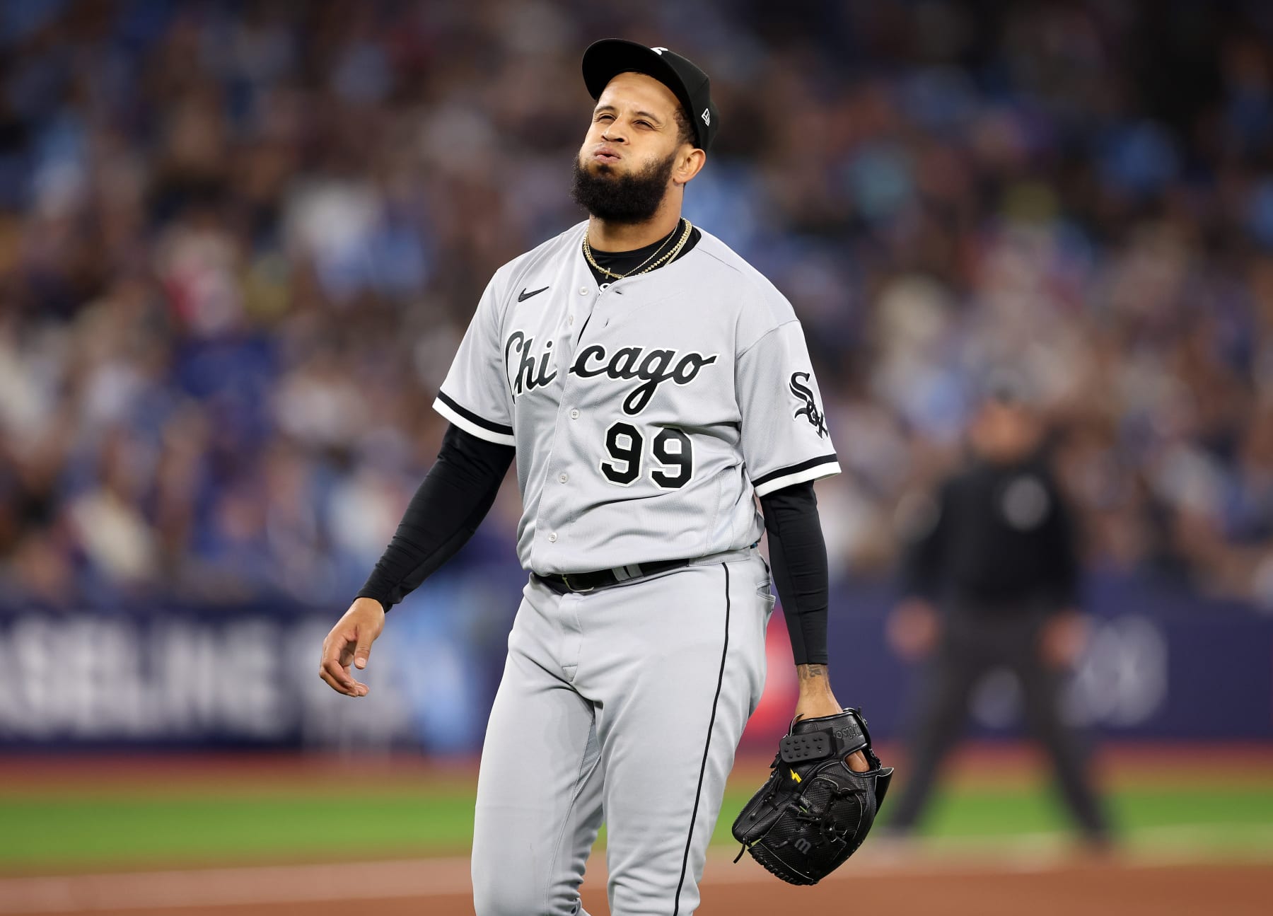 TORONTO, ON - APRIL 26:  Keynan Middleton #99 of the Chicago White Sox reacts as he walks to the dugout against the Toronto Blue Jays at Rogers Centre on April 26, 2023 in Toronto, Ontario, Canada.  (Photo by Vaughn Ridley/Getty Images)