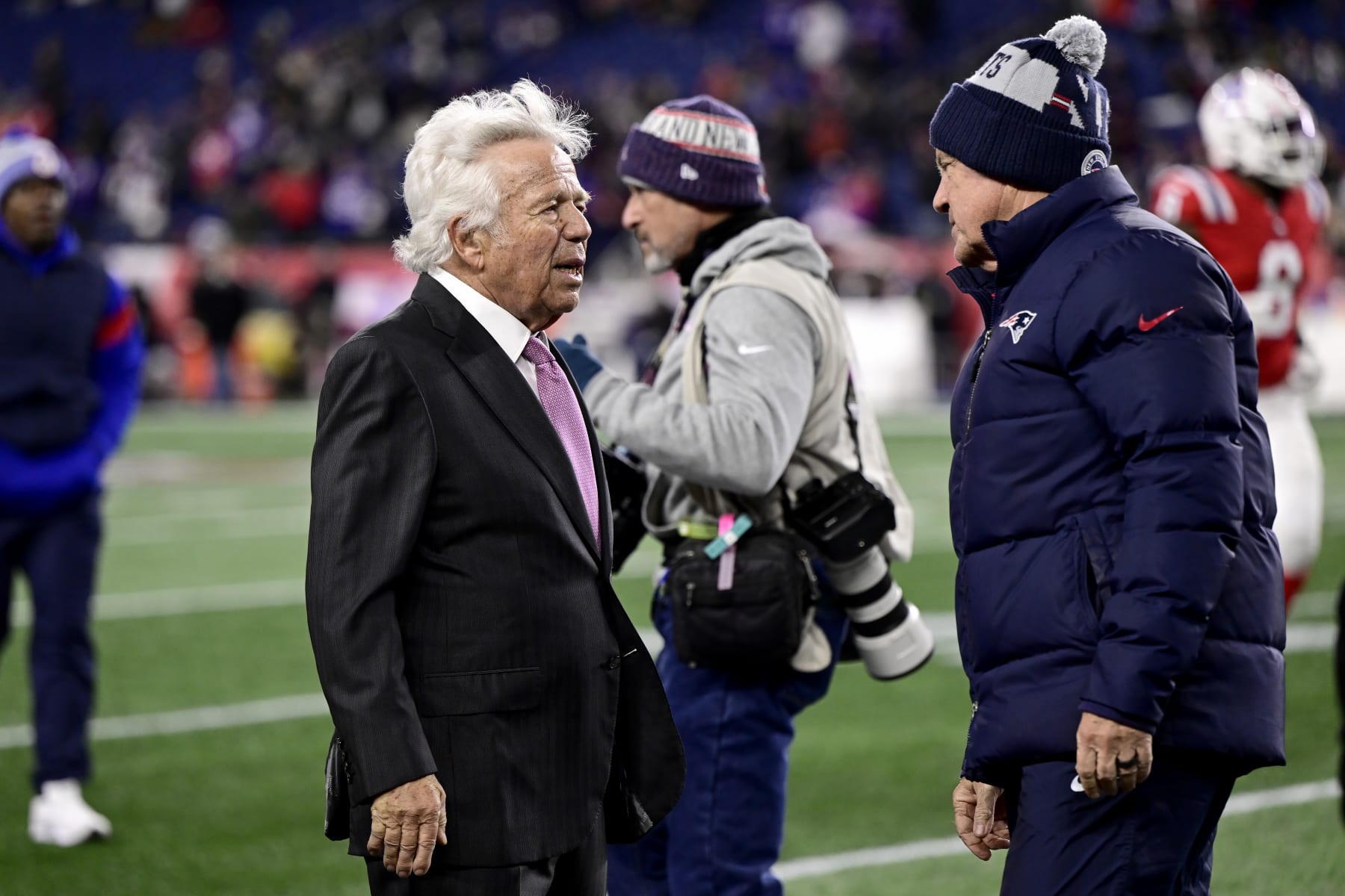 FOXBOROUGH, MASSACHUSETTS - DECEMBER 01: New England Patriots owner Robert Craft (L) and head coach Bill Belichick look on during warm ups before the start of the Patriots and Buffalo Bills game at Gillette Stadium on December 01, 2022 in Foxborough, Massachusetts. (Photo by Billie Weiss/Getty Images)