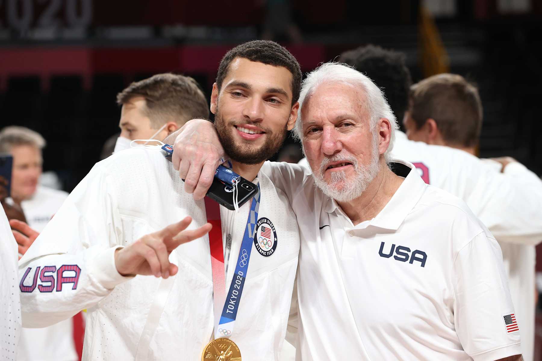 SAITAMA, JAPAN - AUGUST 07: Zachary Lavine and Team United States Head Coach Gregg Popovich pose for photographs during the Men's Basketball medal ceremony on day fifteen of the Tokyo 2020 Olympic Games at Saitama Super Arena on August 07, 2021 in Saitama, Japan. (Photo by Kevin C. Cox/Getty Images)