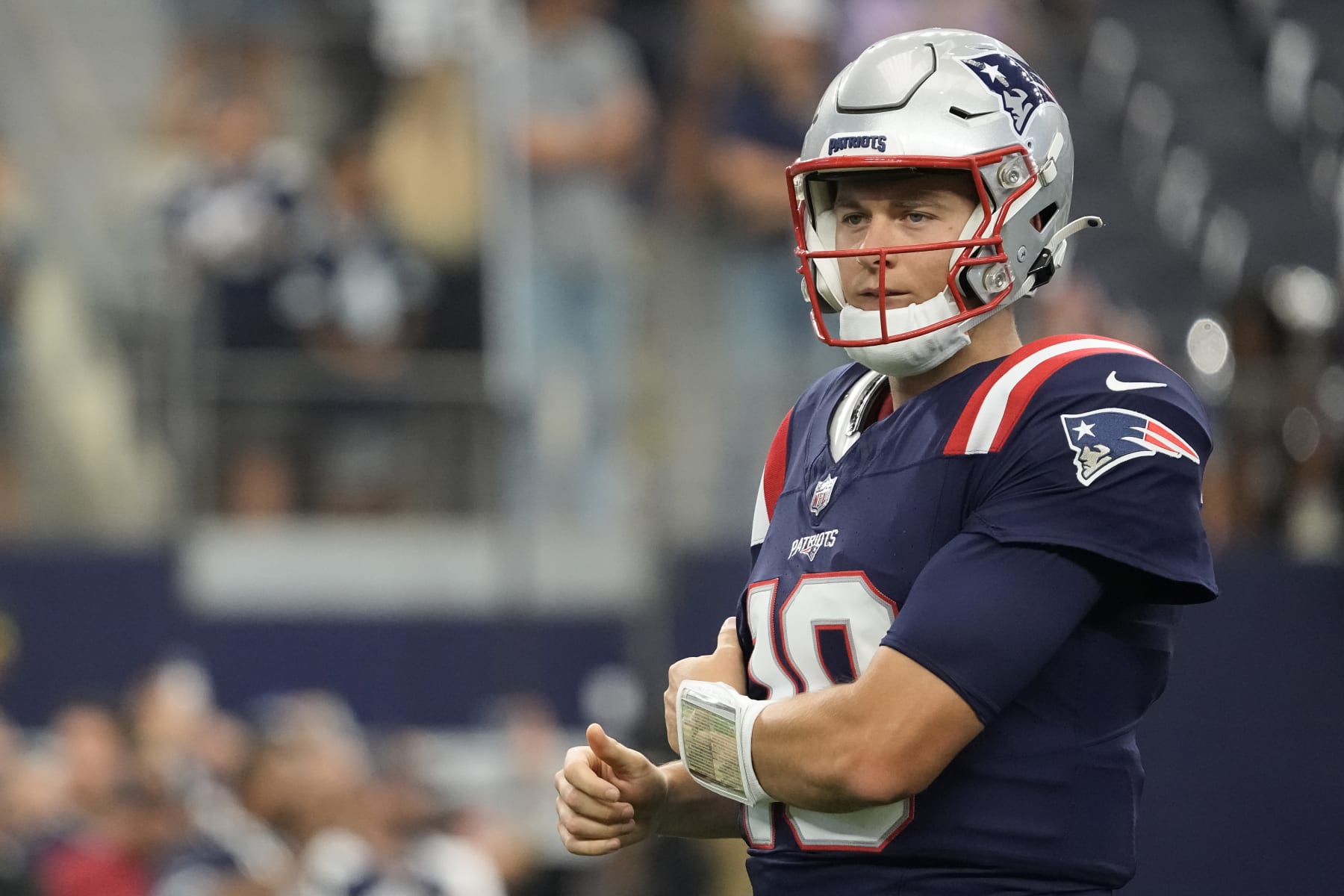 ARLINGTON, TEXAS - OCTOBER 01: Mac Jones #10 of the New England Patriots warms up before the game against the Dallas Cowboys at AT&T Stadium on October 01, 2023 in Arlington, Texas. (Photo by Sam Hodde/Getty Images)