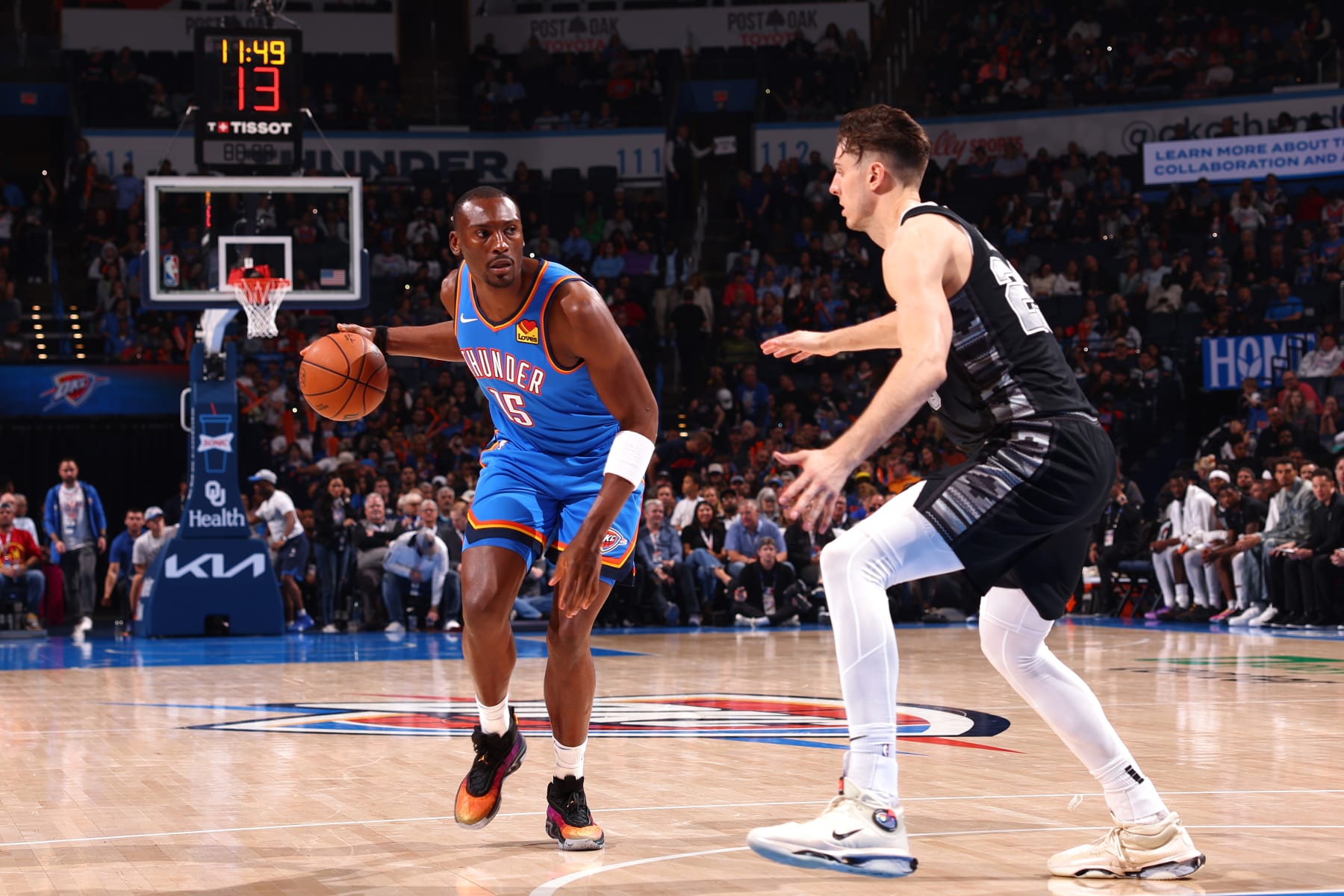 OKLAHOMA CITY, OK - APRIL 10:   Bismack Biyombo #15 of the Oklahoma City Thunder handles the ball during the game against the San Antonio Spurs on April 10, 2024 at Paycom Arena in Oklahoma City, Oklahoma. NOTE TO USER: User expressly acknowledges and agrees that, by downloading and or using this photograph, User is consenting to the terms and conditions of the Getty Images License Agreement. Mandatory Copyright Notice: Copyright 2024 NBAE (Photo by Zach Beeker/NBAE via Getty Images)