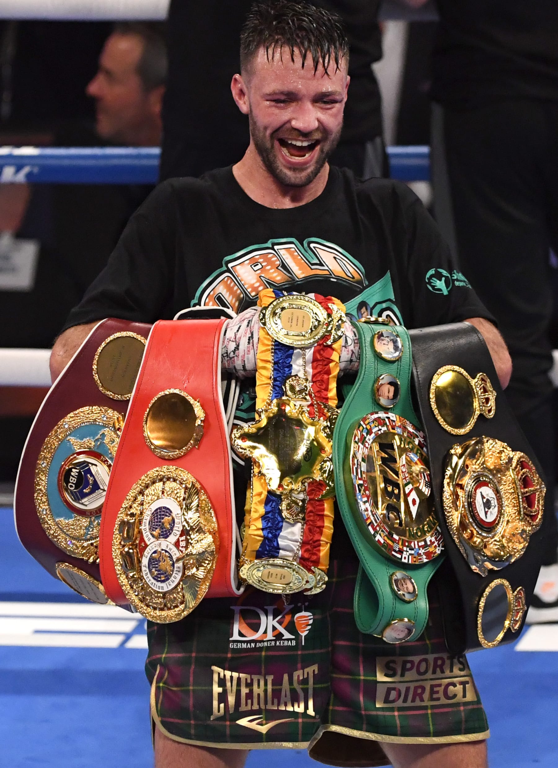 LAS VEGAS, NEVADA - MAY 22: Josh Taylor poses with his title belts after his win by unanimous decision over Jose Ramirez in their junior welterweight world unification title fight at Virgin Hotels Las Vegas on May 22, 2021 in Las Vegas, Nevada.  (Photo by David Becker/Getty Images)