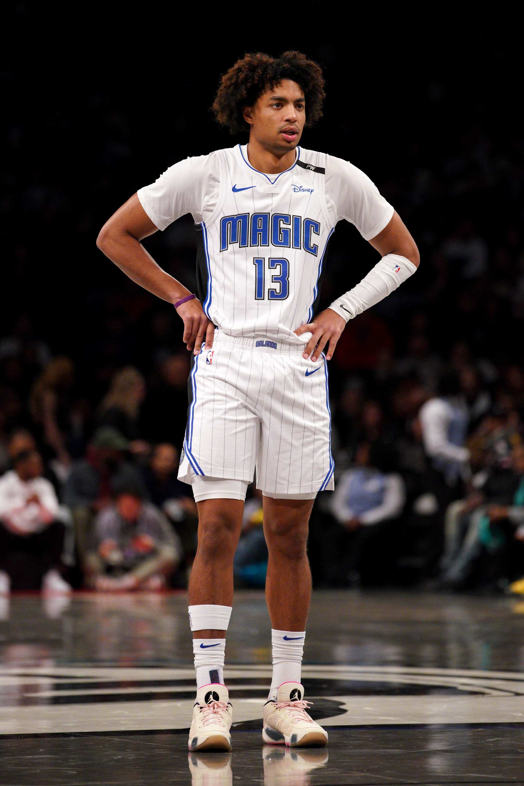 NEW YORK, NEW YORK - DECEMBER 01: Jett Howard #13 of the Orlando Magic looks on against the Brooklyn Nets during the second half at Barclays Center on December 01, 2024 in New York City. NOTE TO USER: User expressly acknowledges and agrees that, by downloading and or using this photograph, User is consenting to the terms and conditions of the Getty Images License Agreement. (Photo by Evan Bernstein/Getty Images)